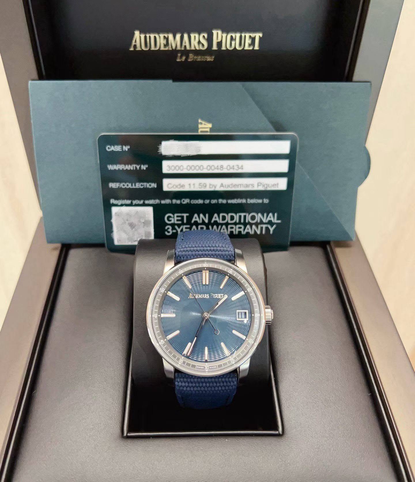 May be an image of wrist watch and text that says 'AUDEMARS PIGUET CASE N WAPRANTY NP REF/OOLLECTION Code Rogleter your watgh by Audemars Piquet he weblink belowto GET AN…