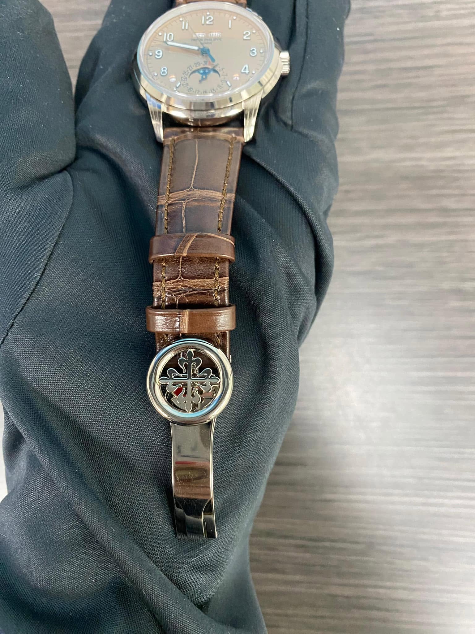 May be an image of wrist watch and text