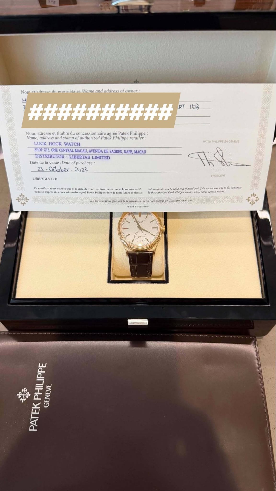 May be an image of wrist watch and text