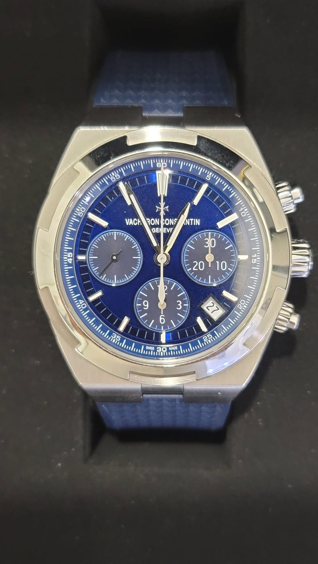 May be an image of wrist watch and text