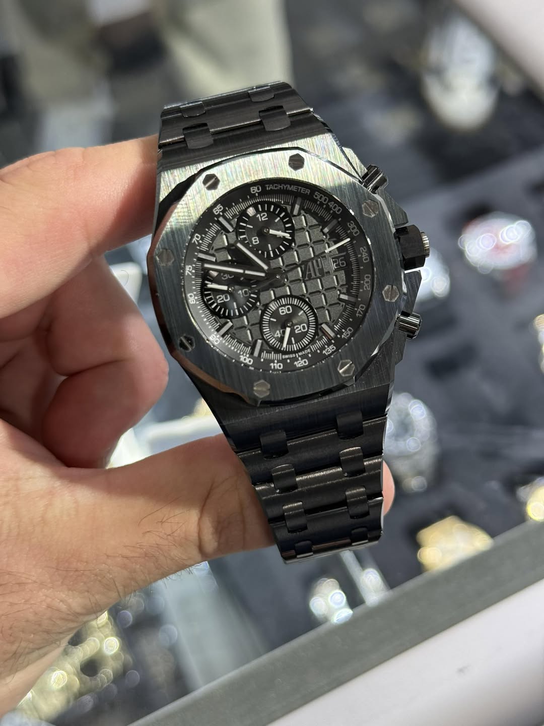 May be an image of wrist watch and text