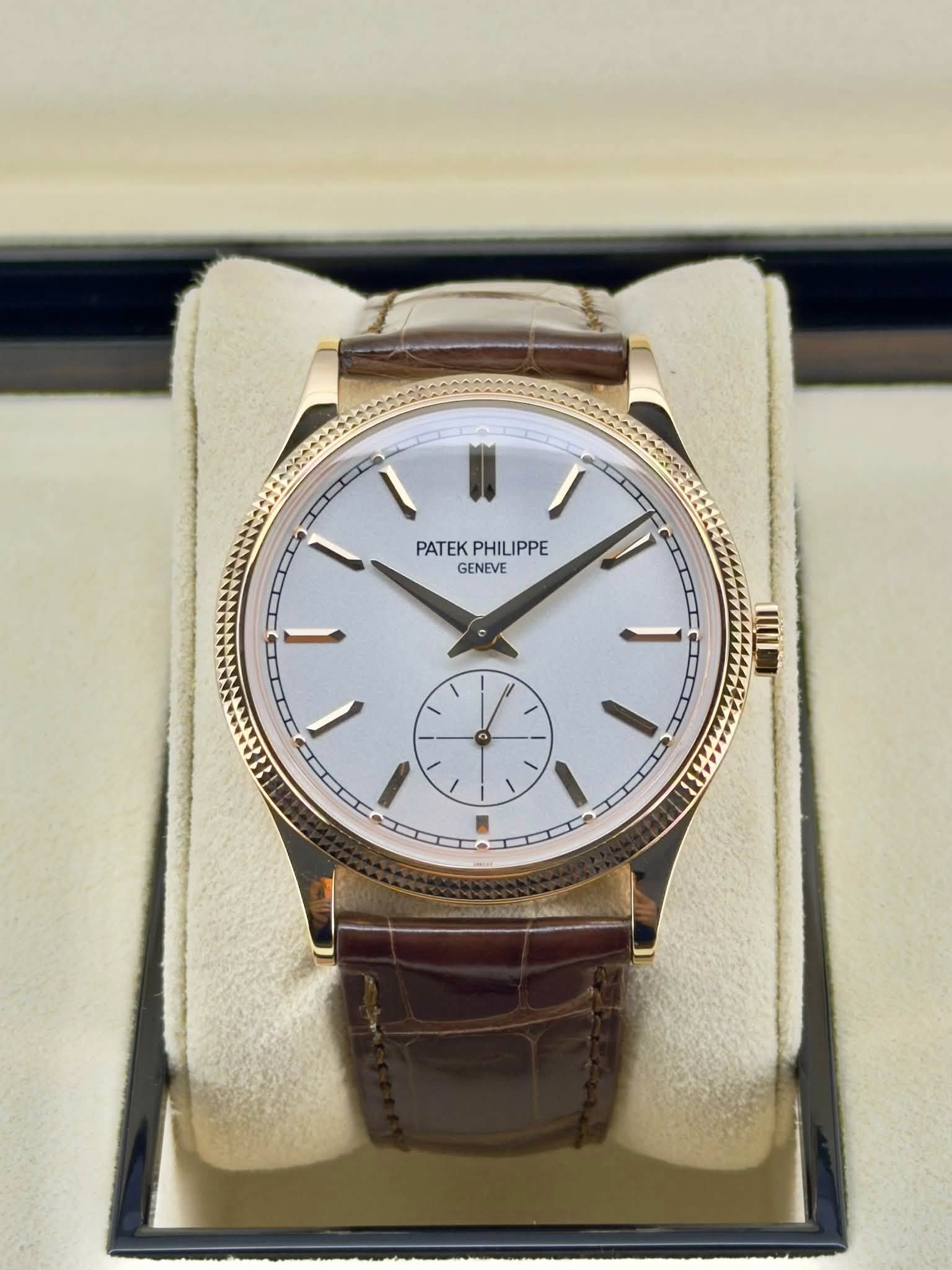 May be an image of wrist watch and text that says 'PATEKPHILIPPE PATEK PHILIPPE GENEVE'