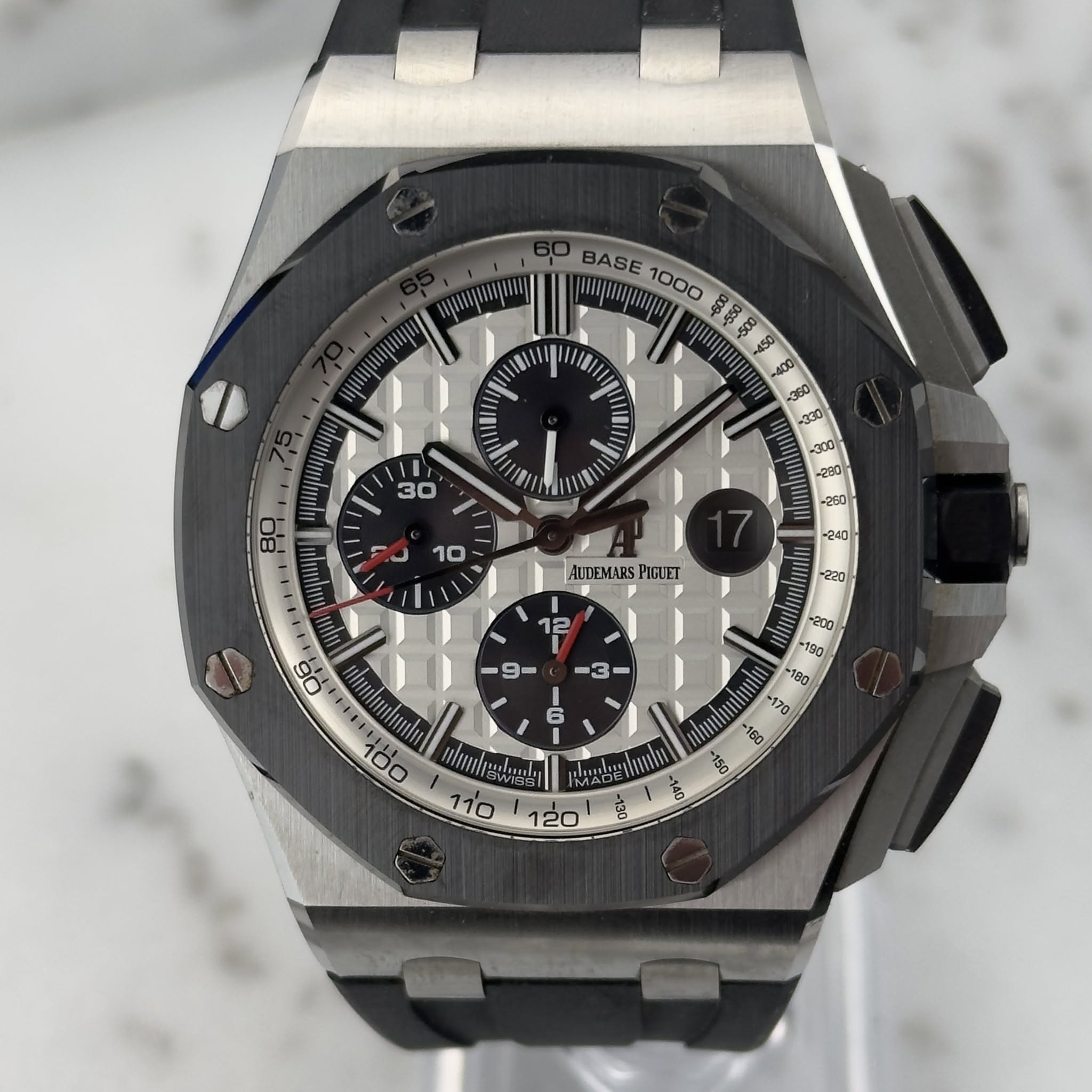 May be an image of wrist watch and text
