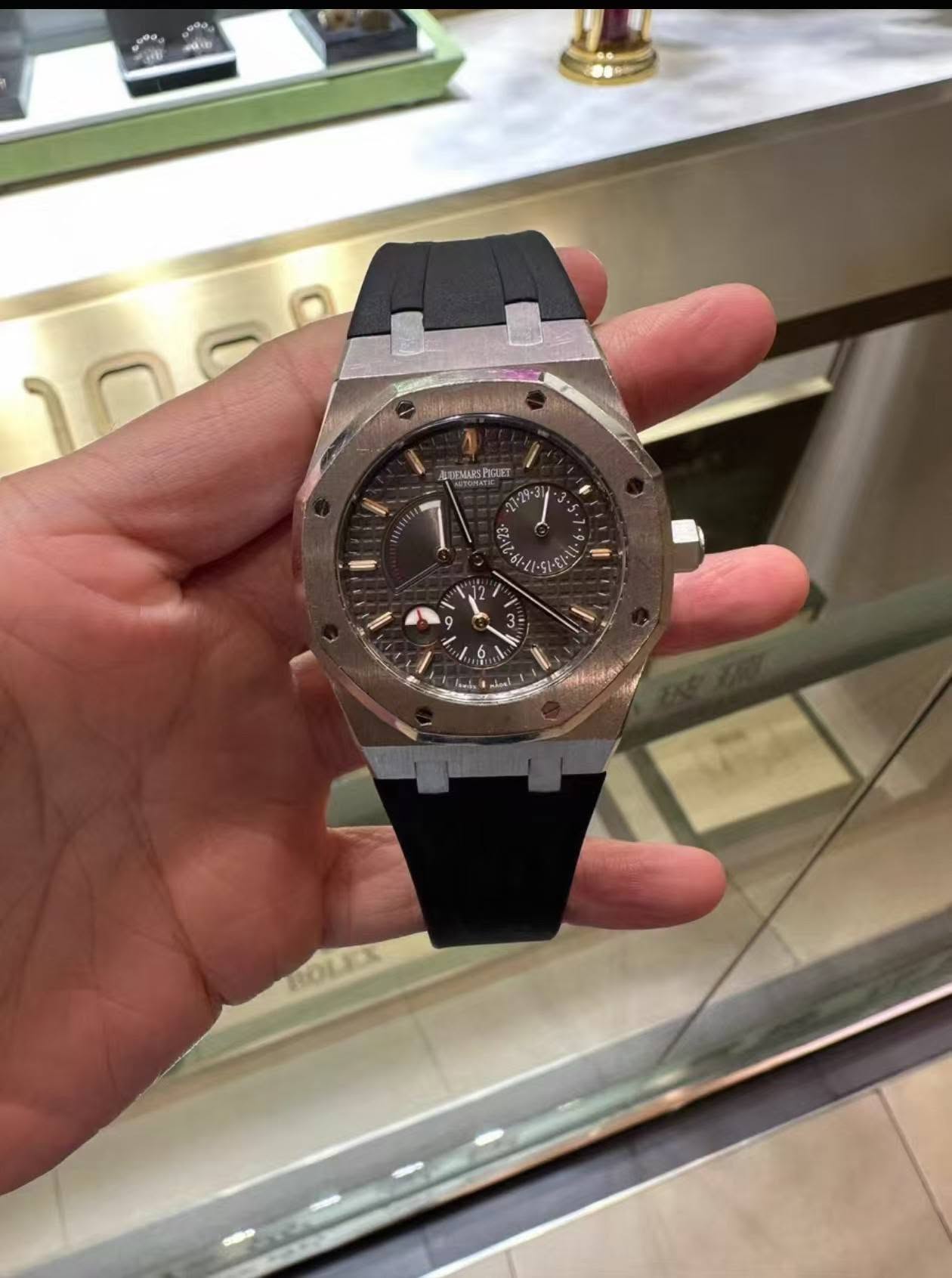 May be an image of wrist watch and text