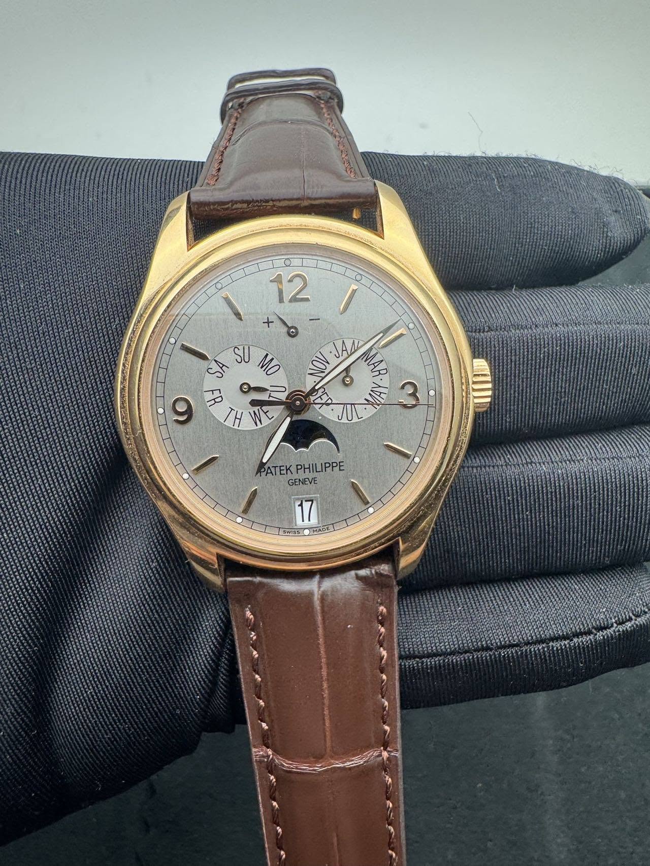 May be an image of wrist watch and text