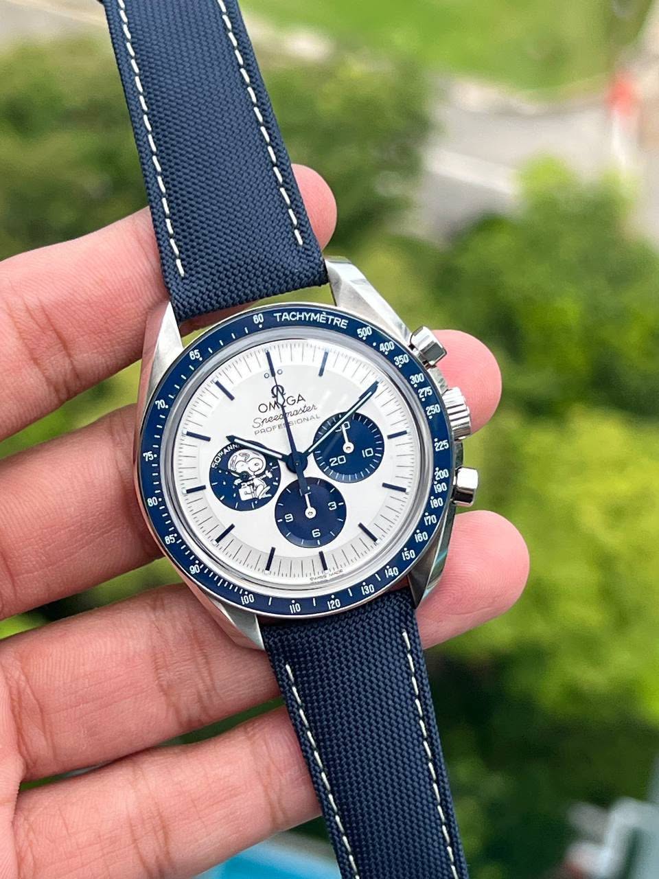 May be an image of wrist watch and text that says 'هد 60 TACHYMETRE 500 400 ឧ្ក 品に ំ 10 OM OMIGA antor sastar த acP Sneec SIONAL ਹੇ P 0 1 S 20 ITT 80 3- 9 ស 80 6 SS i0 120'