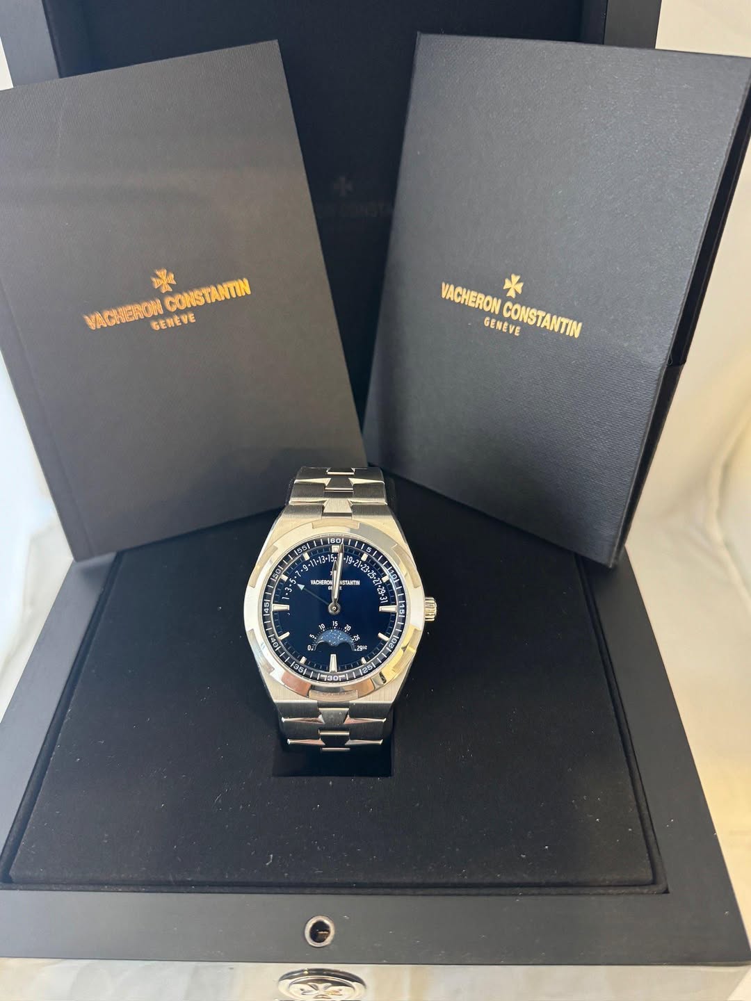 May be an image of wrist watch and text