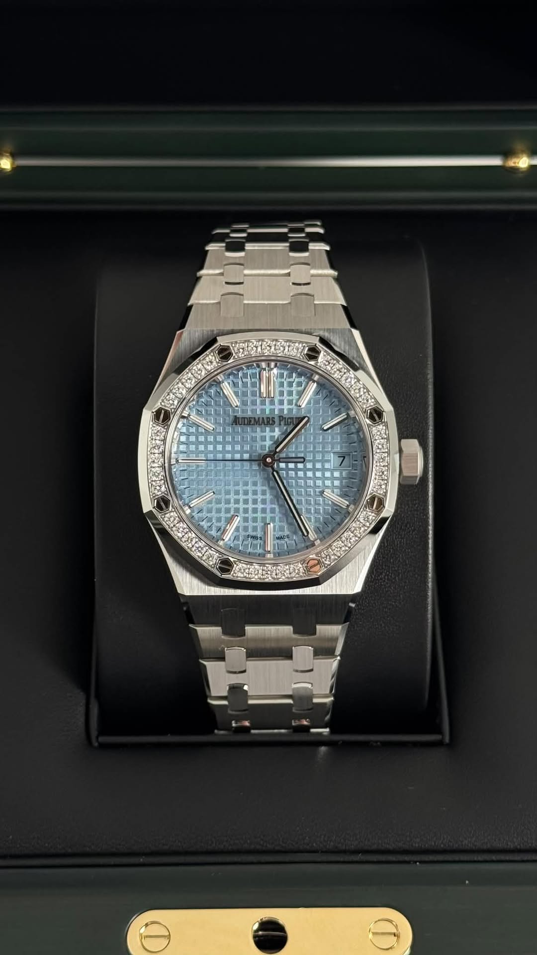 May be an image of wrist watch and text