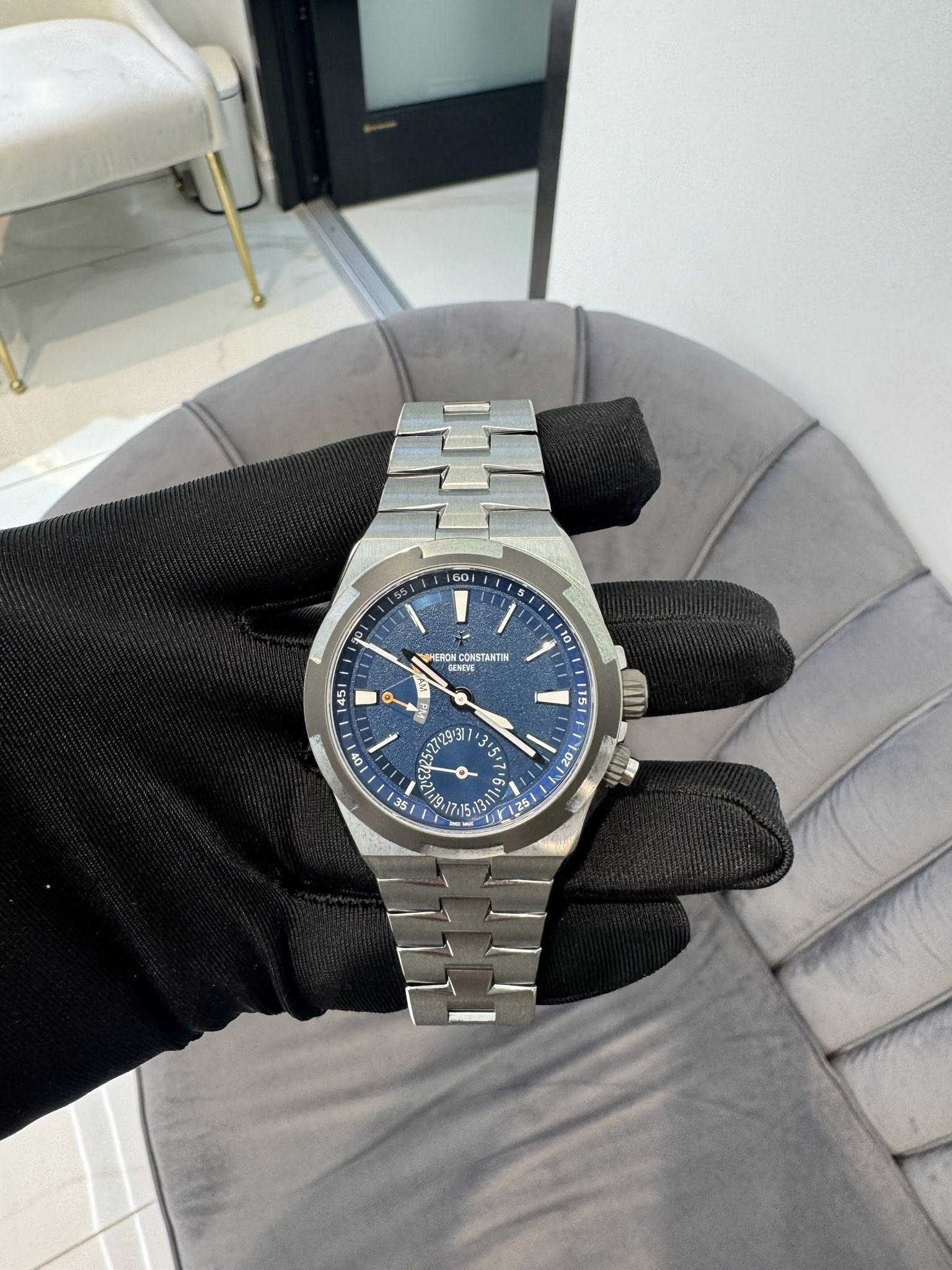 May be an image of wrist watch and text