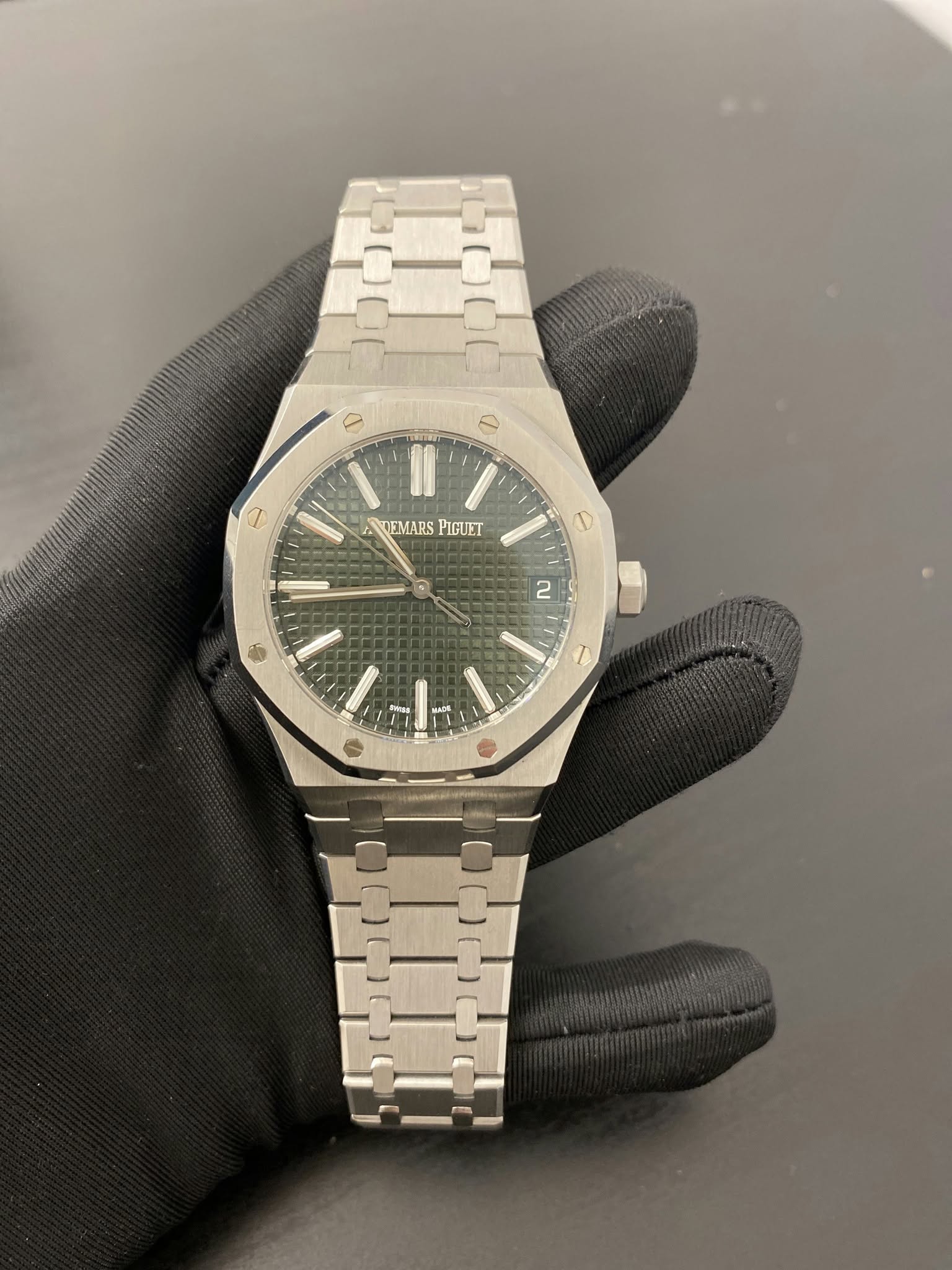 May be an image of wrist watch and text