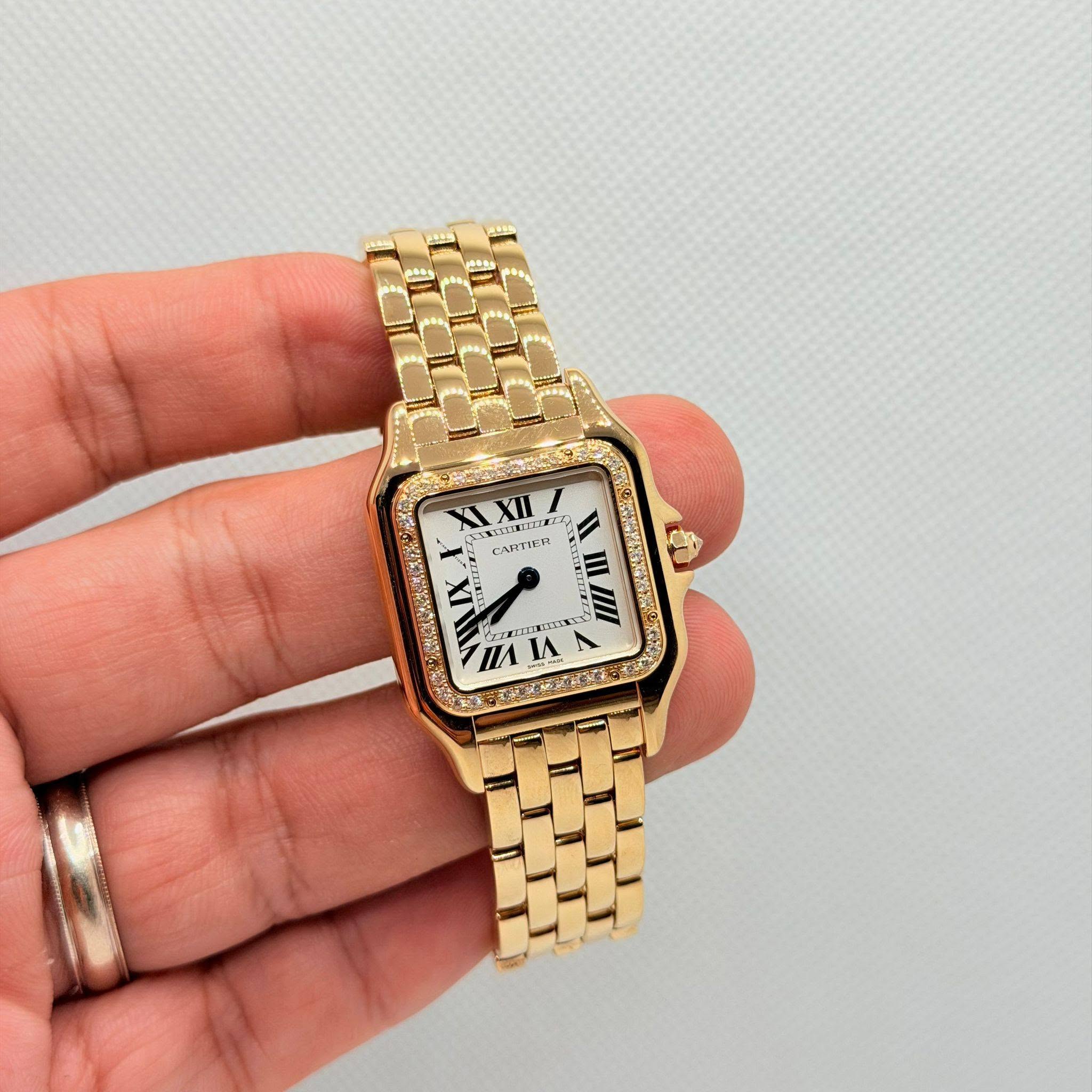 May be an image of digital watch and text