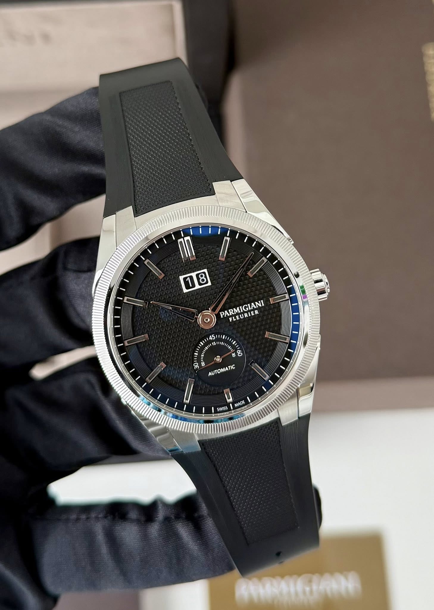 May be an image of digital watch and text that says 'I 1 8 PARMIGIANI FLEURIER 4 N5 特か 6 AUTOMATIC ATS MACK'