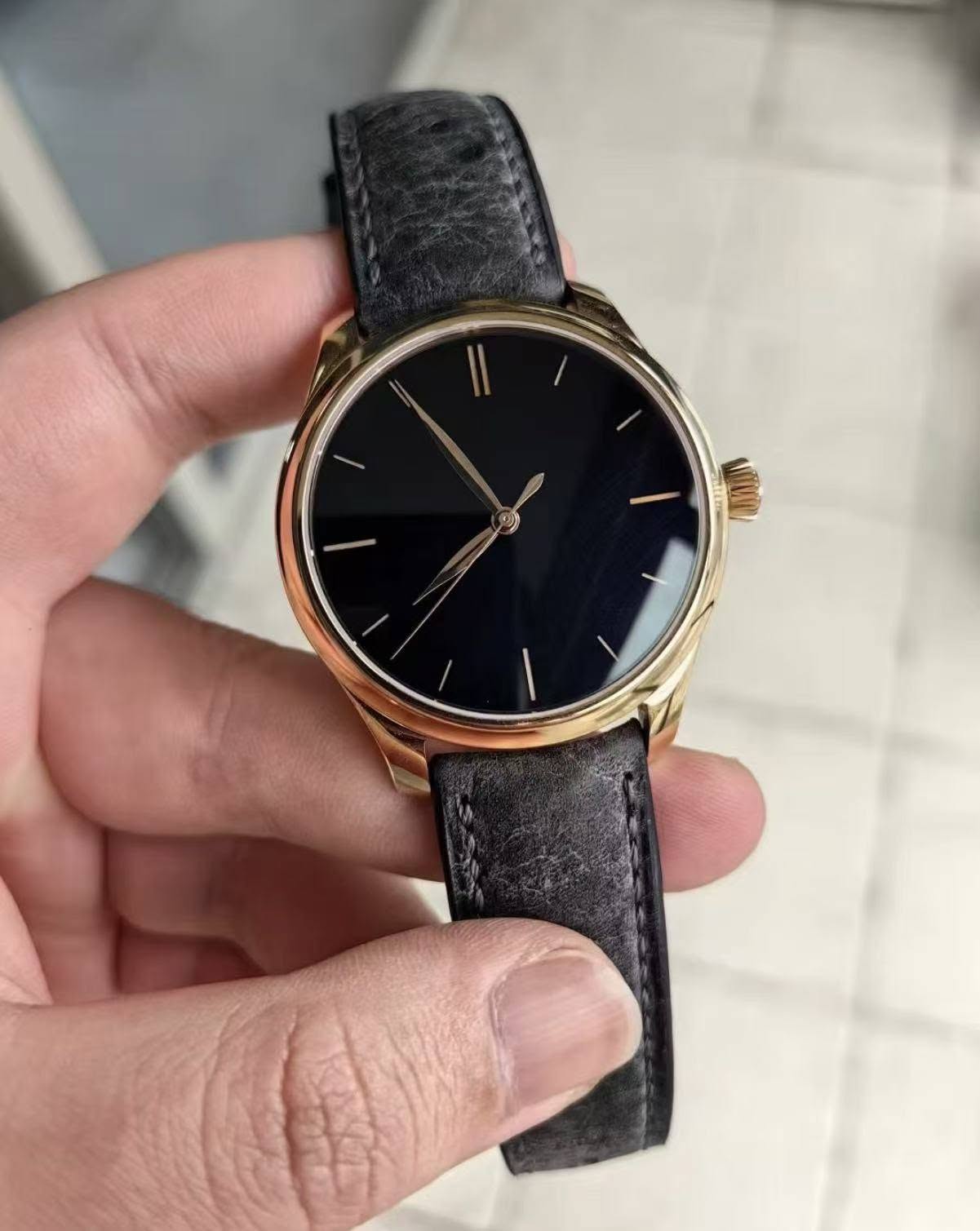 May be an image of wrist watch