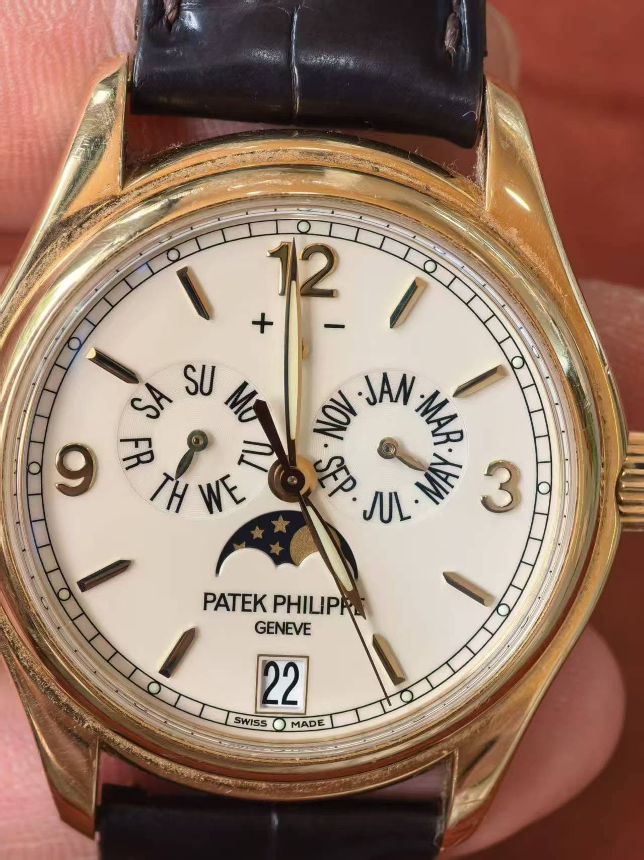 May be an image of wrist watch and text