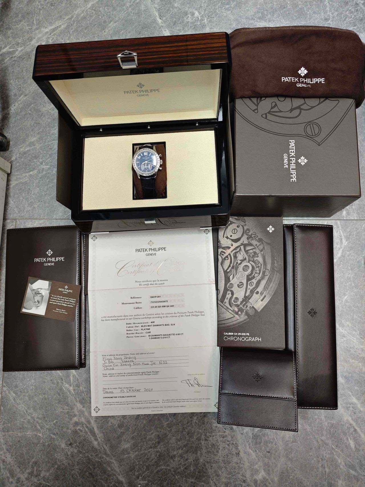 May be an image of wrist watch, leather wallet and text