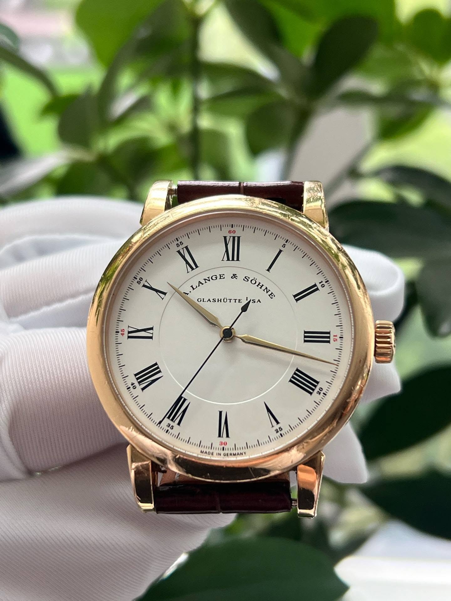 May be an image of wrist watch and text