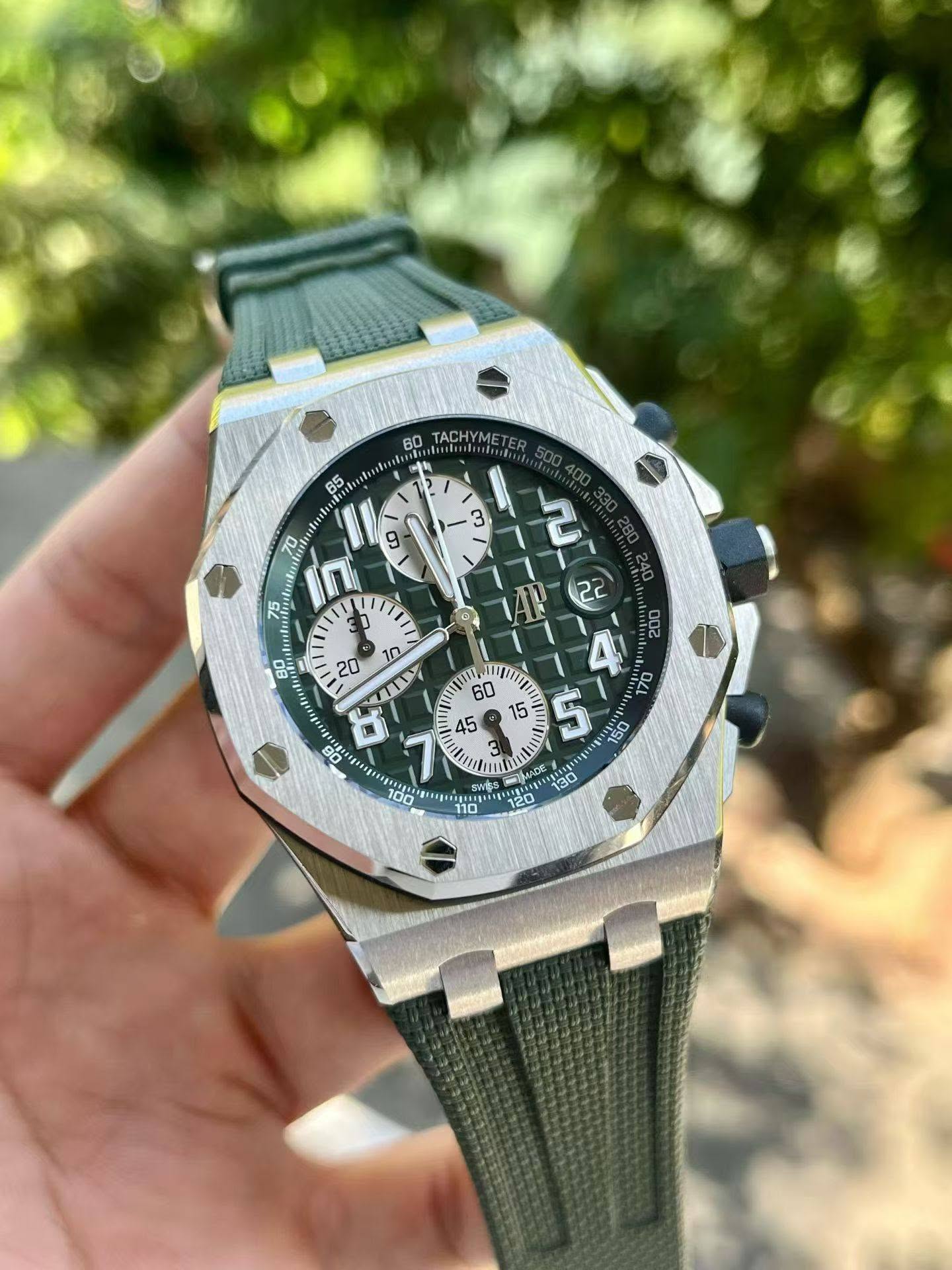 May be an image of wrist watch and text