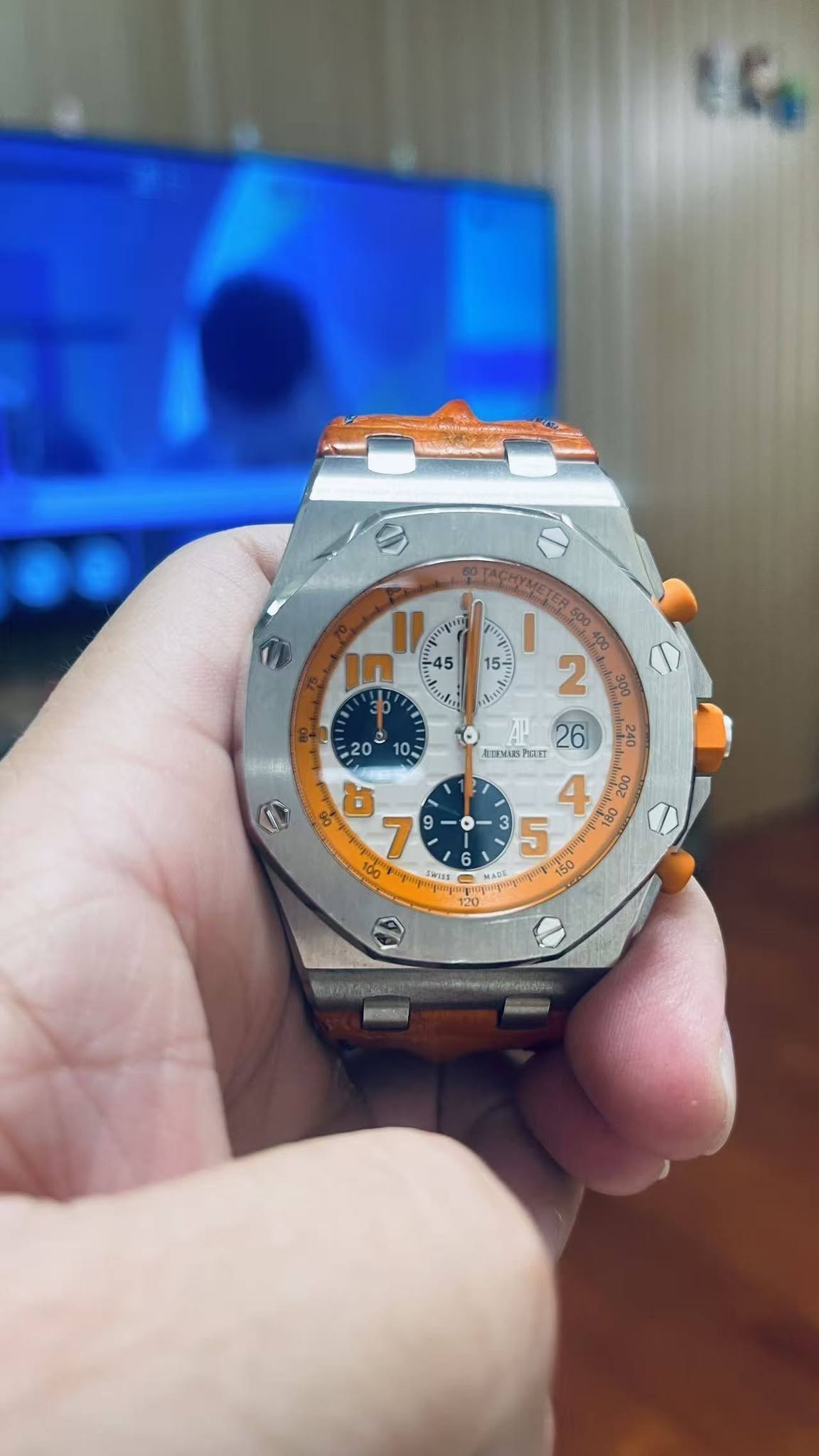 May be an image of digital watch and text