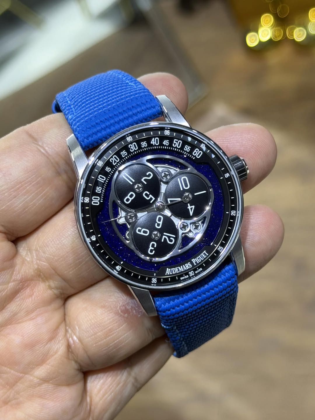 May be an image of wrist watch and text