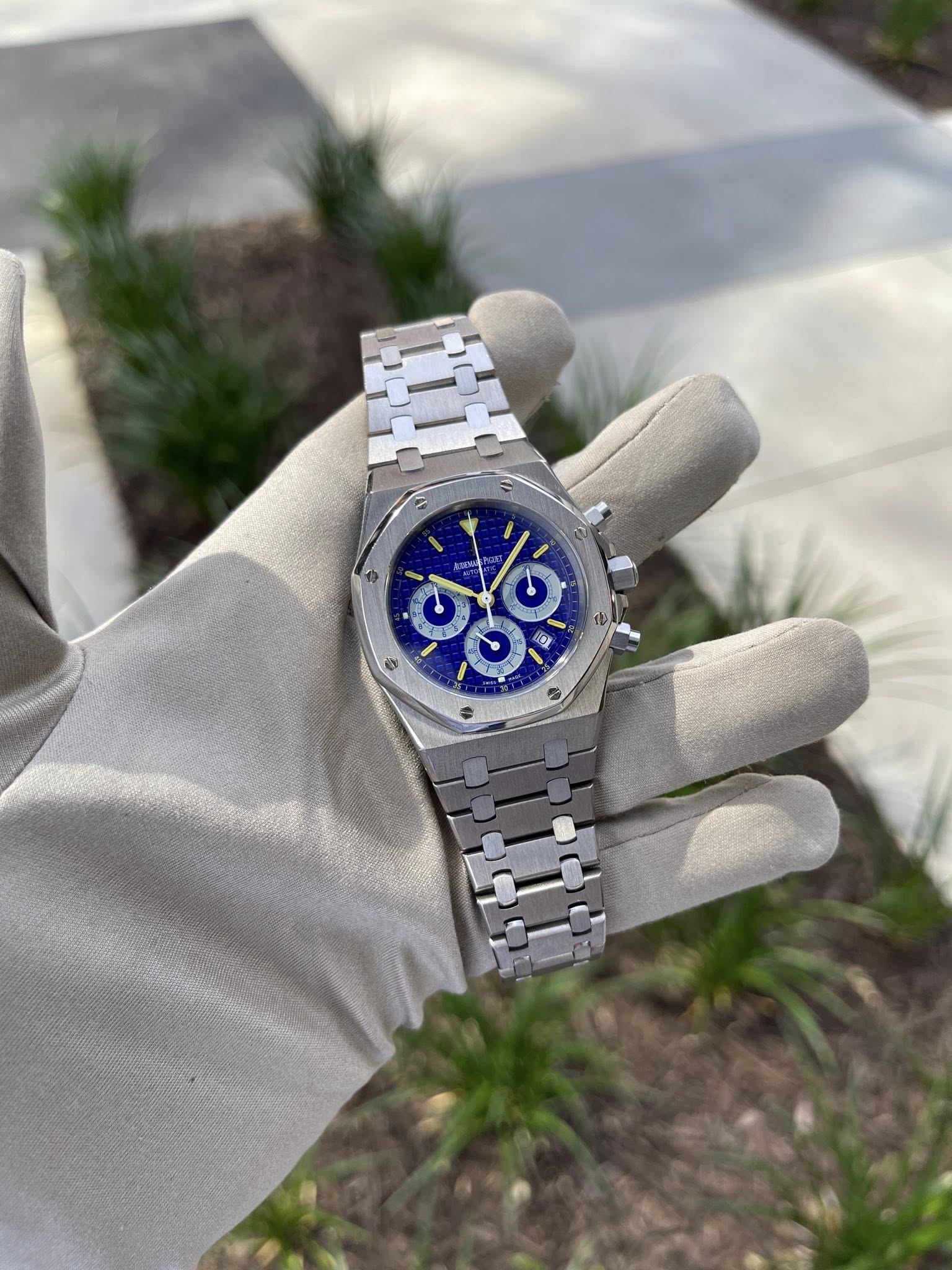 May be an image of wrist watch and text