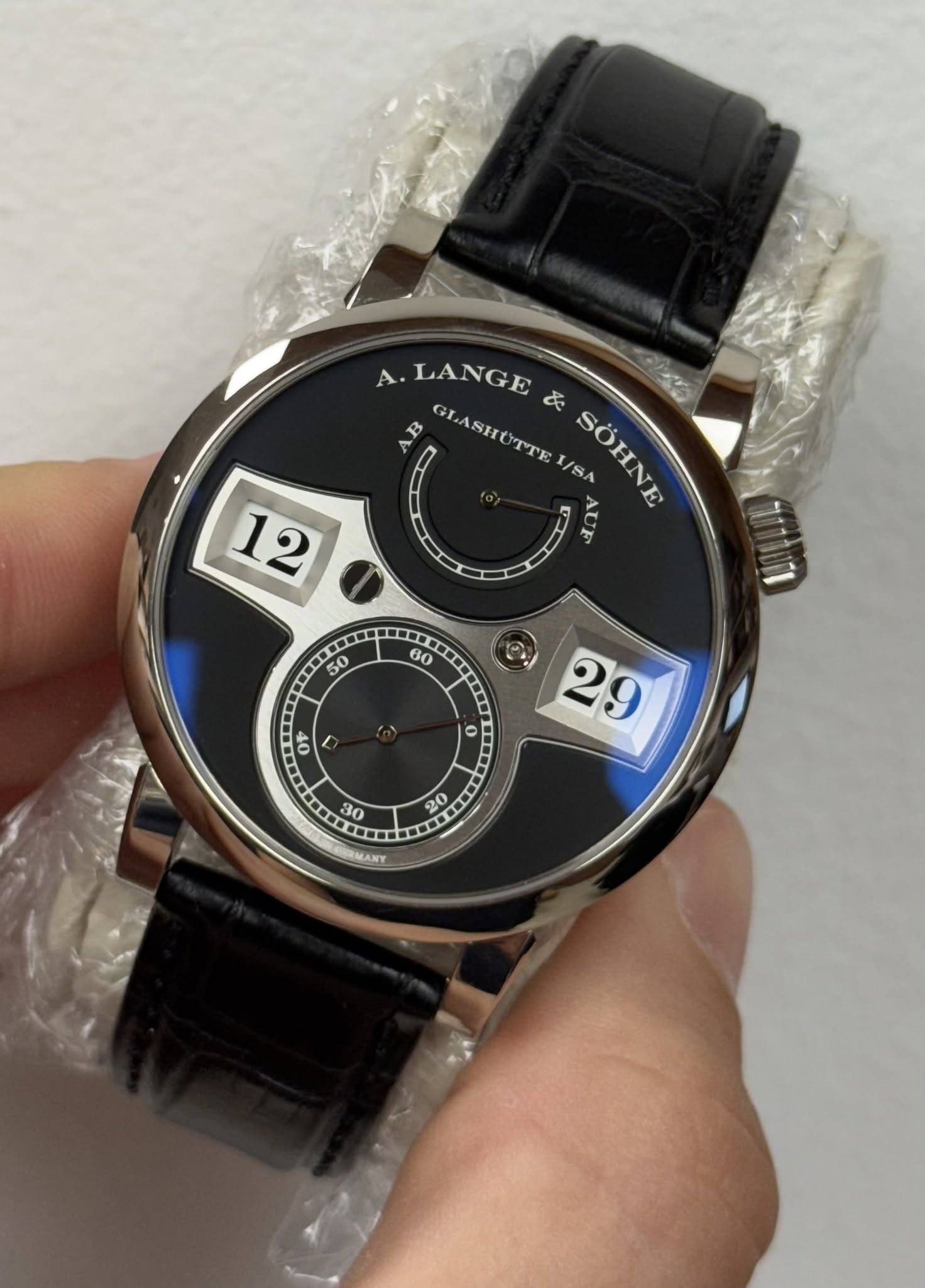 May be an image of digital watch and text that says 'A.LANGE A 民 GLASHUTTEI/SA SÓHING SOHNE I/SA 12 60 50 OF o @ 29 30 20 O ·· MAXY'