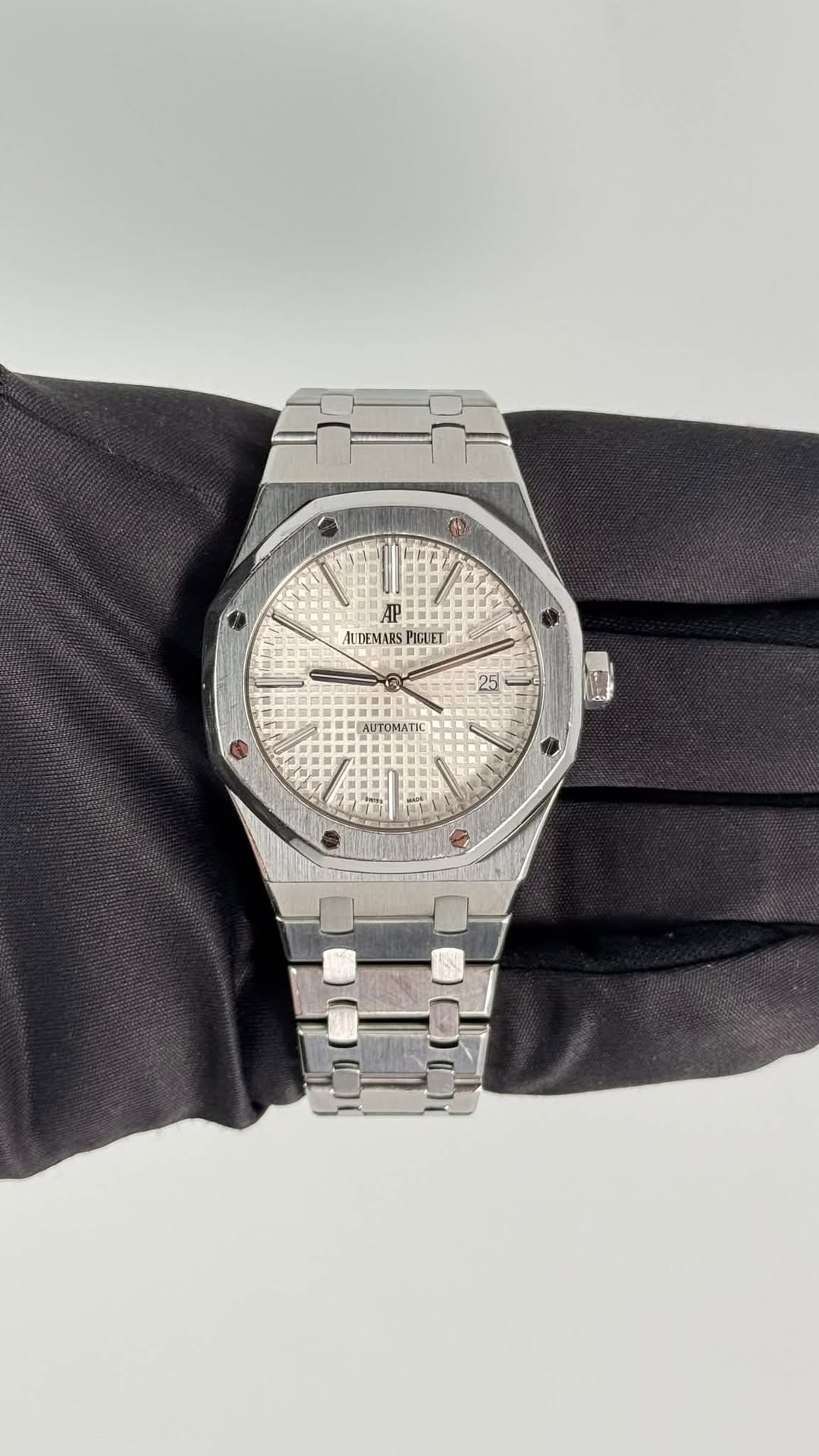 May be an image of wrist watch and text