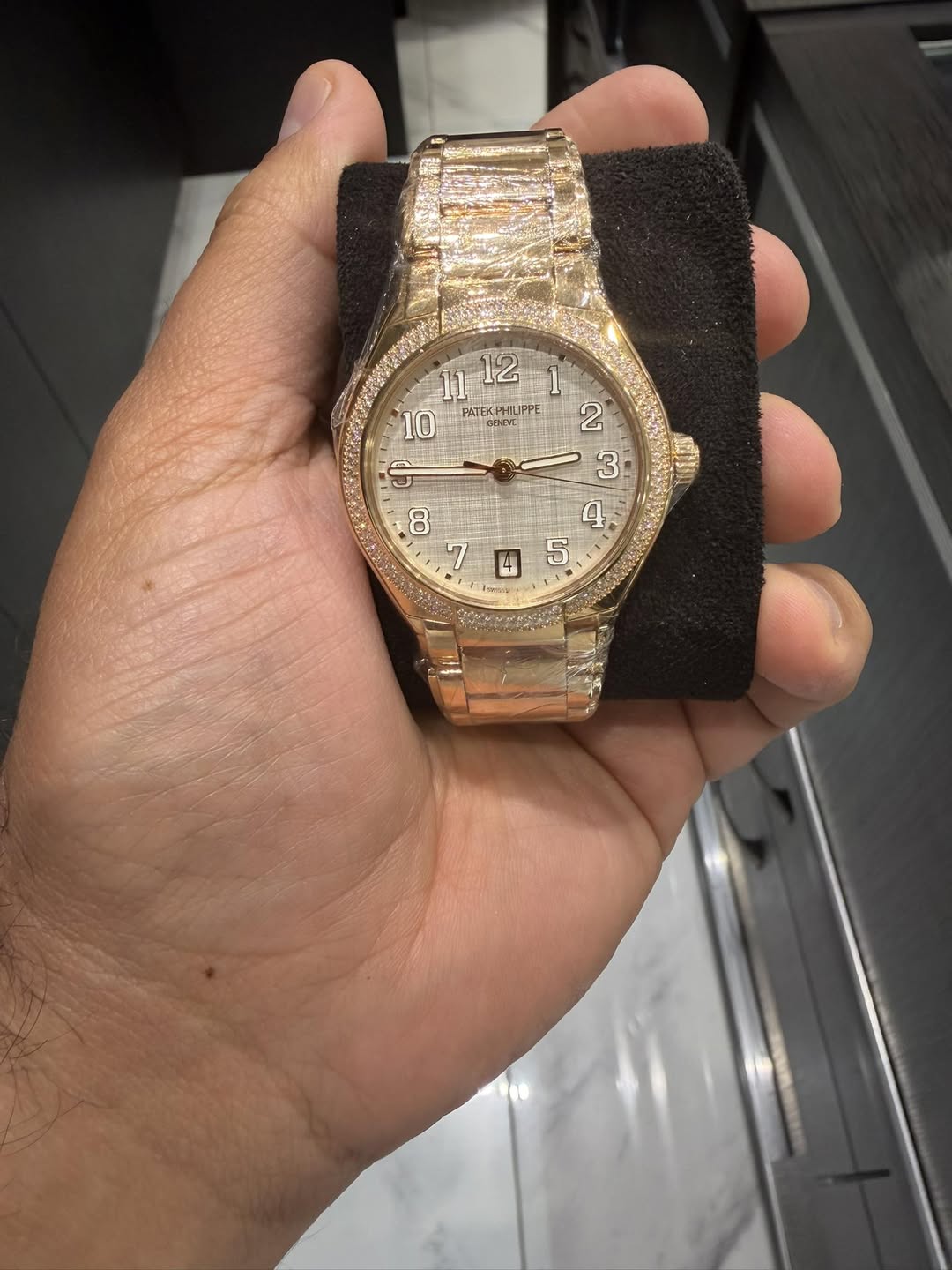 May be an image of wrist watch and text that says ' PATEKPHIJPPE 2 3 ه '