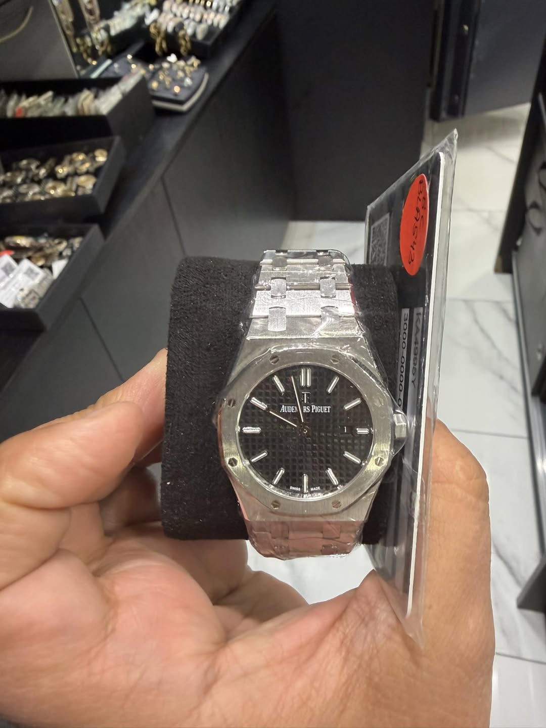 May be an image of wrist watch and text