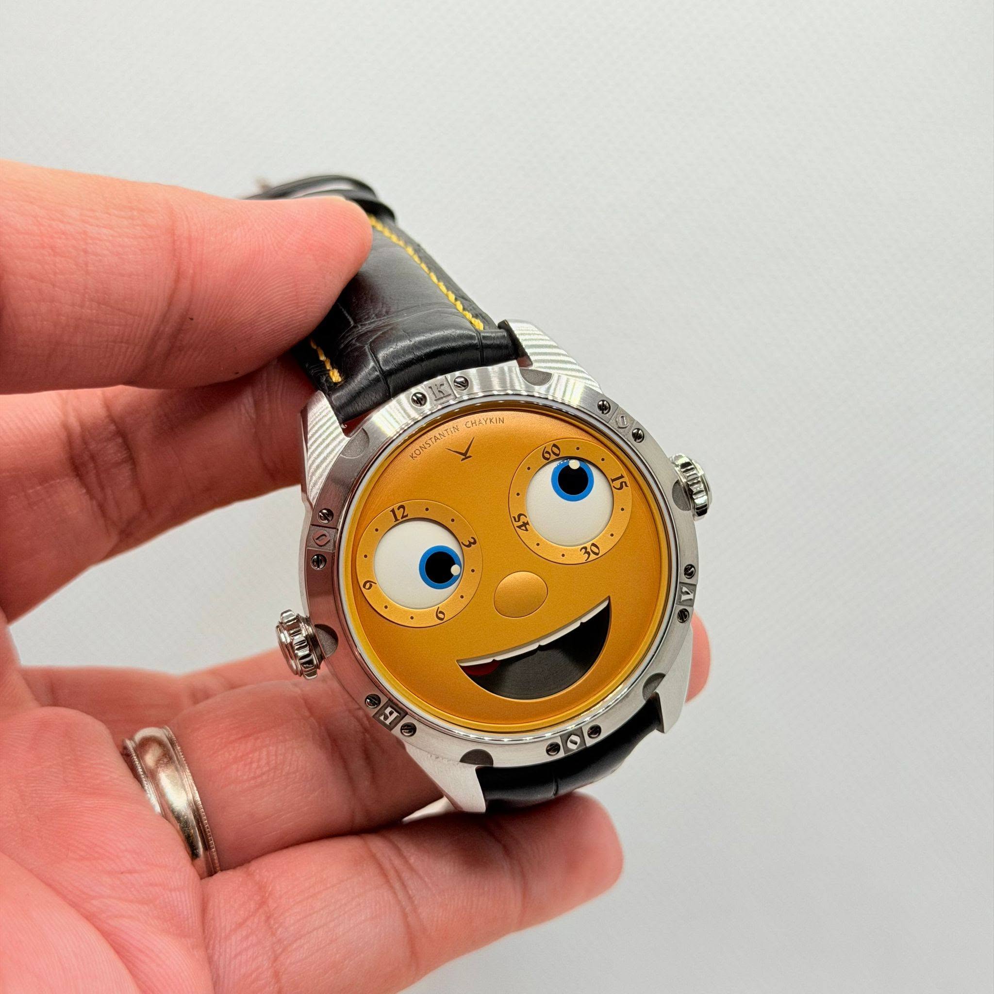 May be an image of toy, digital watch and text