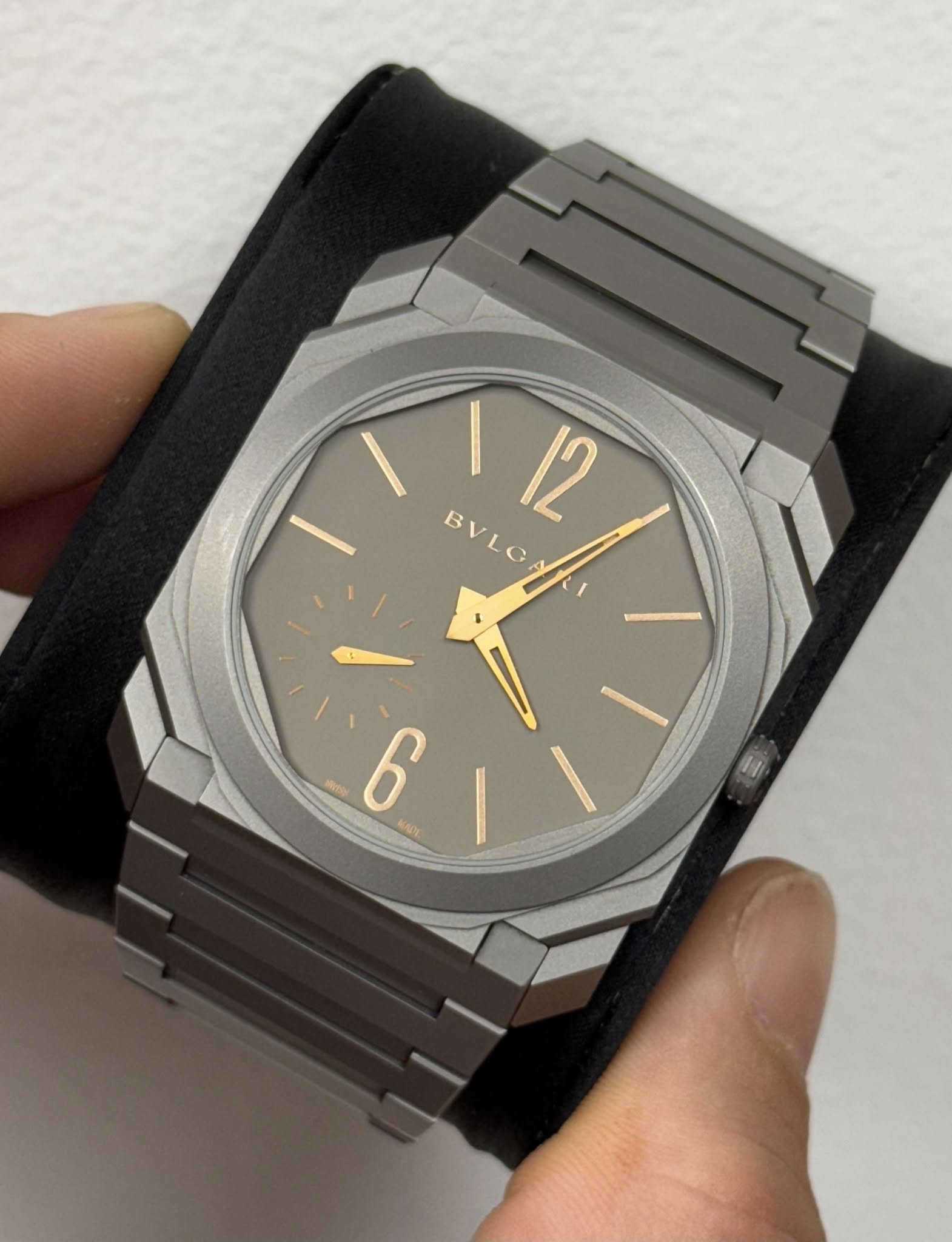 May be an image of wrist watch and text