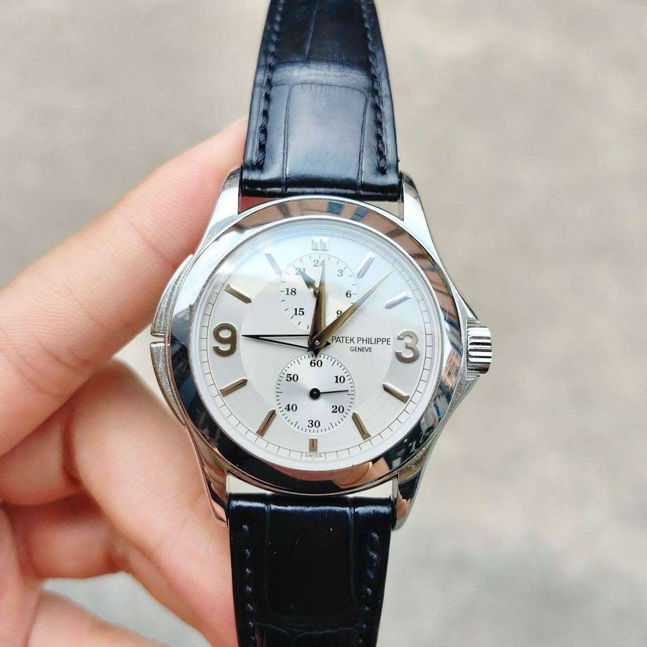 May be an image of wrist watch and text