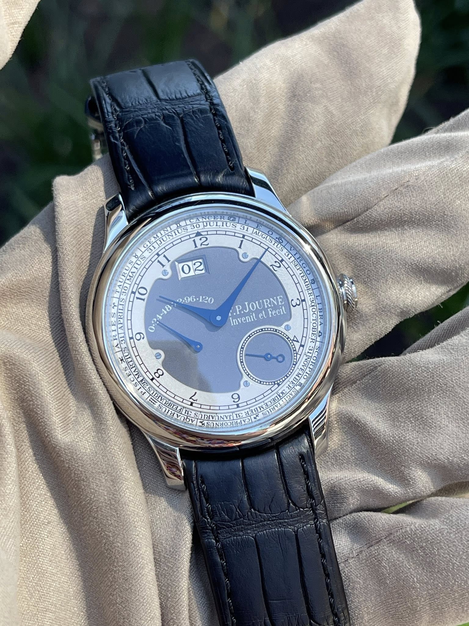 May be an image of wrist watch and text