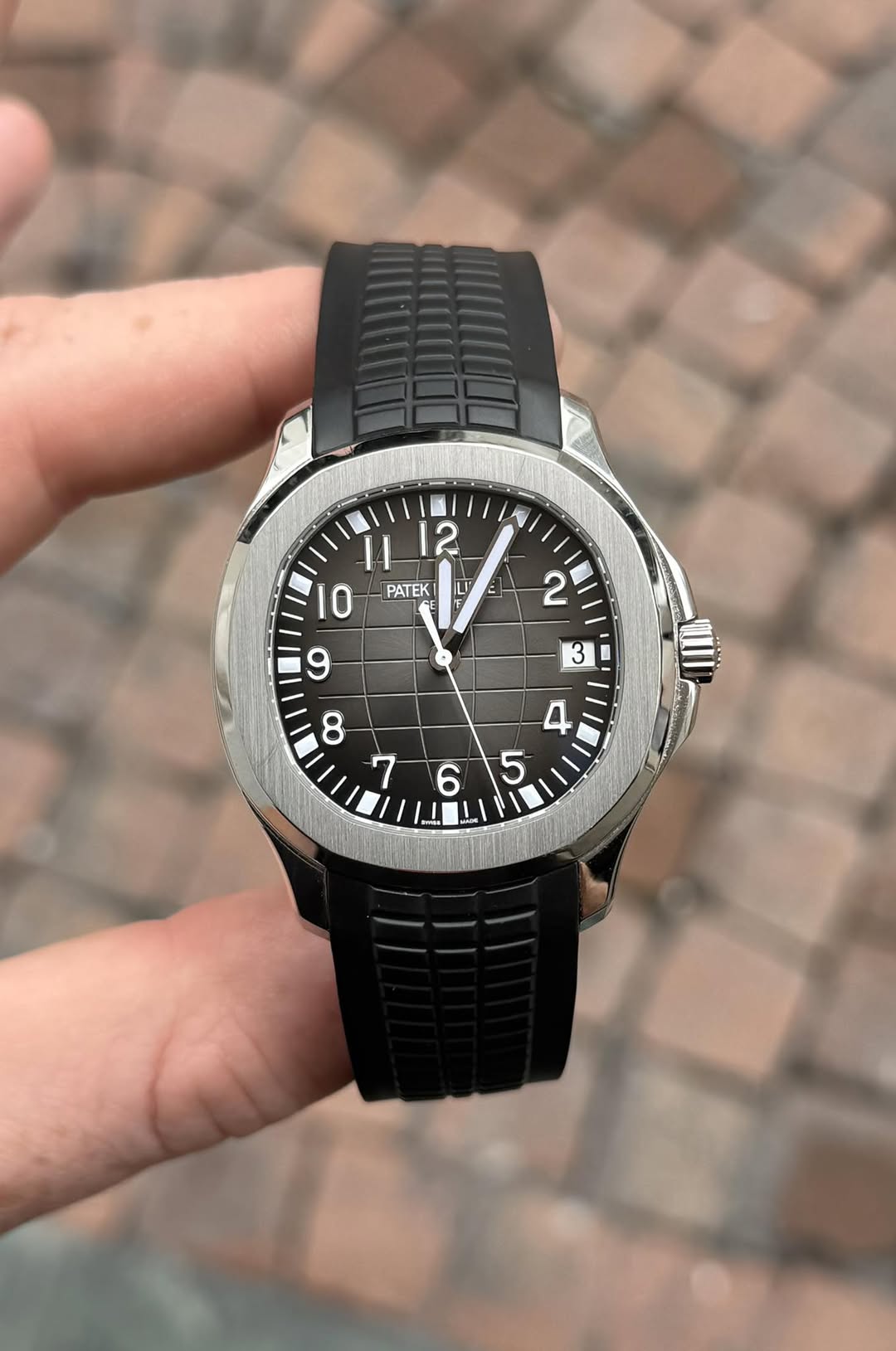 May be an image of wrist watch and text that says 'X K 1I PATEK LV '