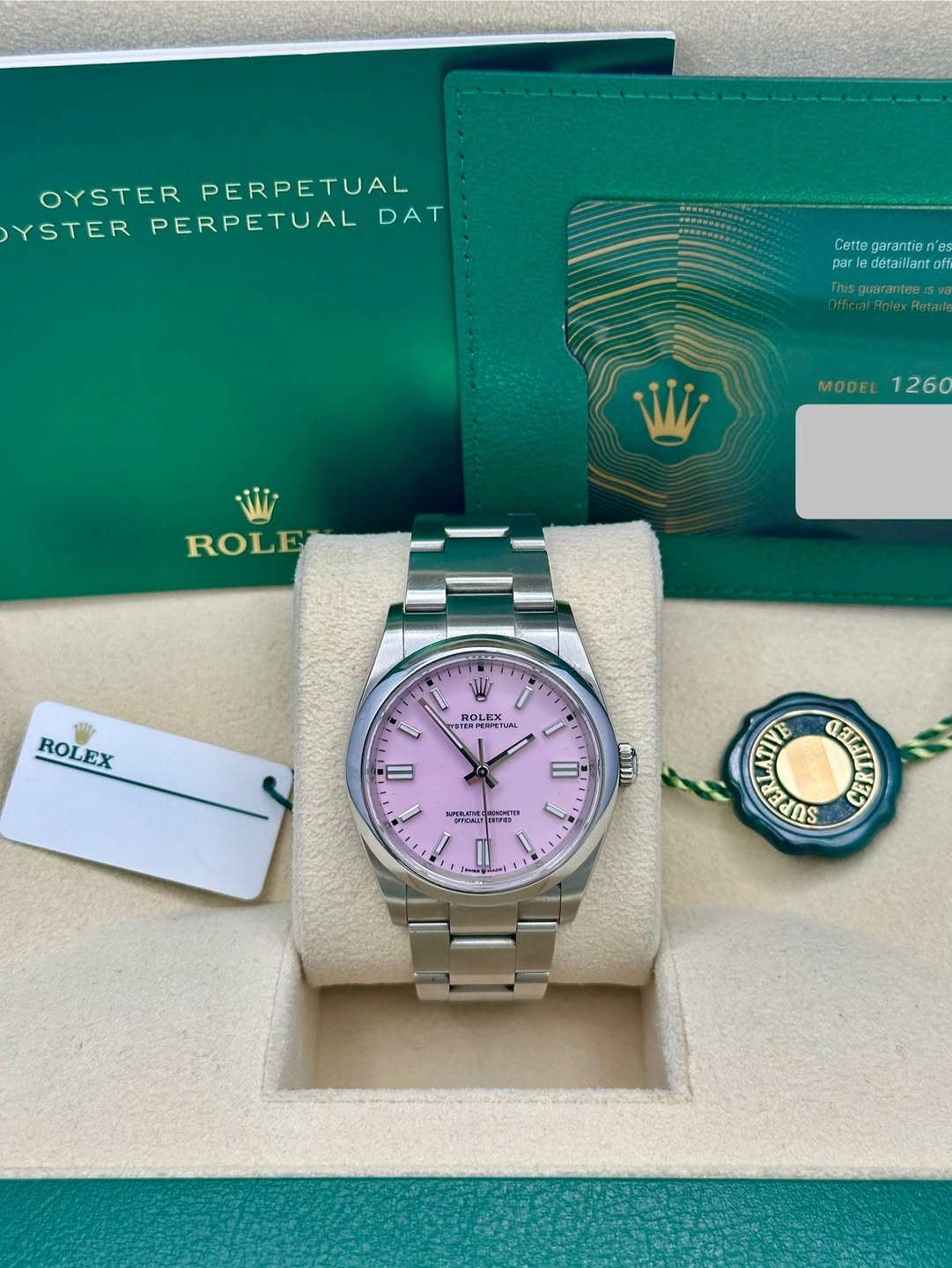 May be an image of wrist watch and text