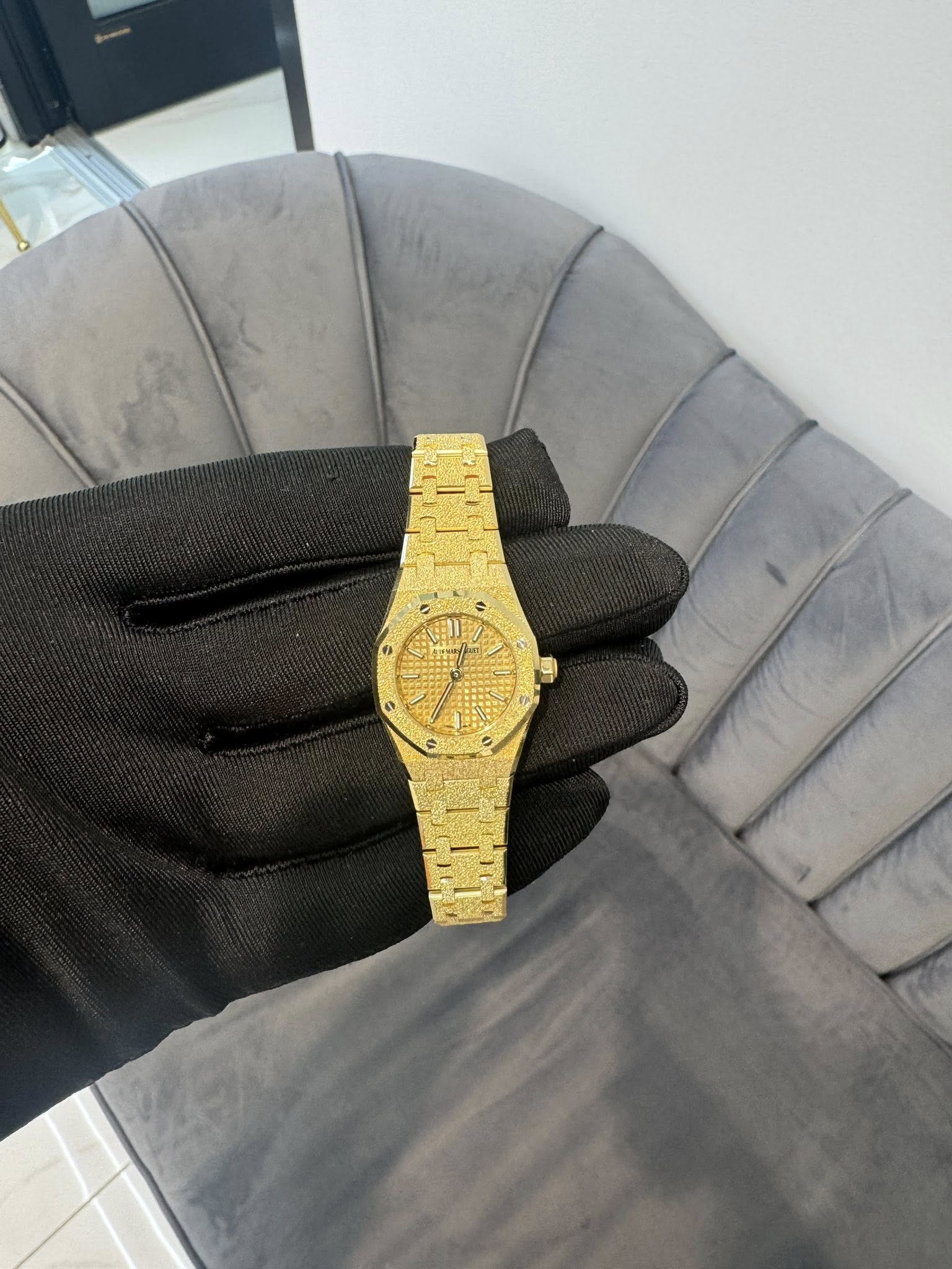 May be an image of wrist watch and text that says 'e'