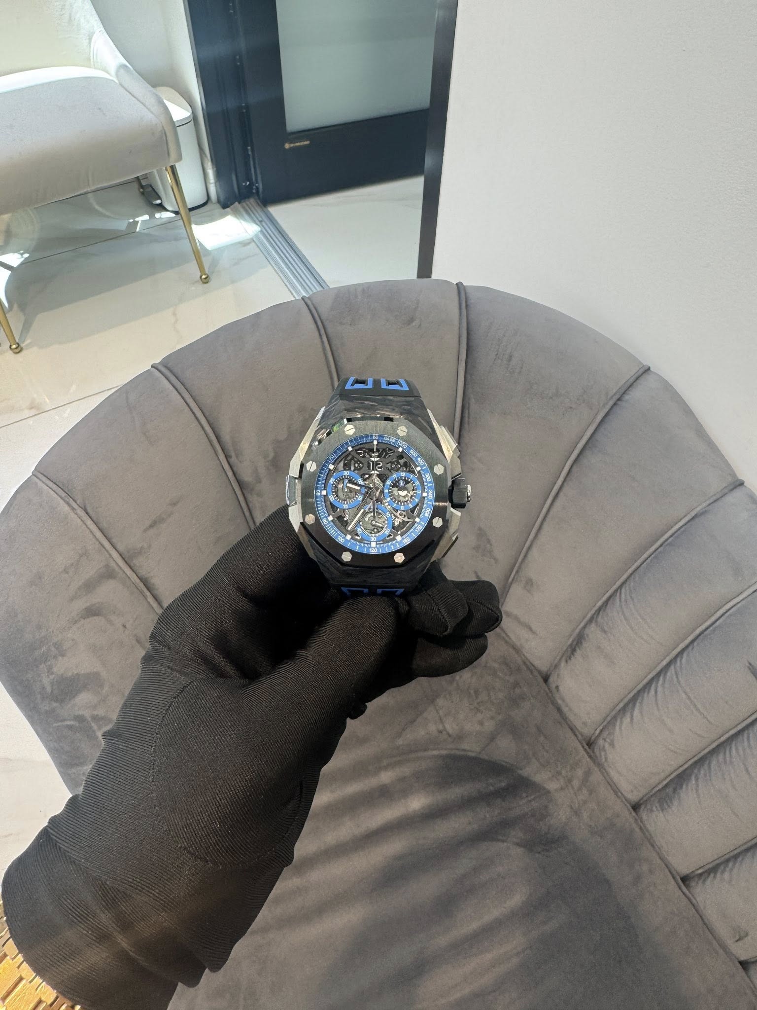 May be an image of wrist watch and text