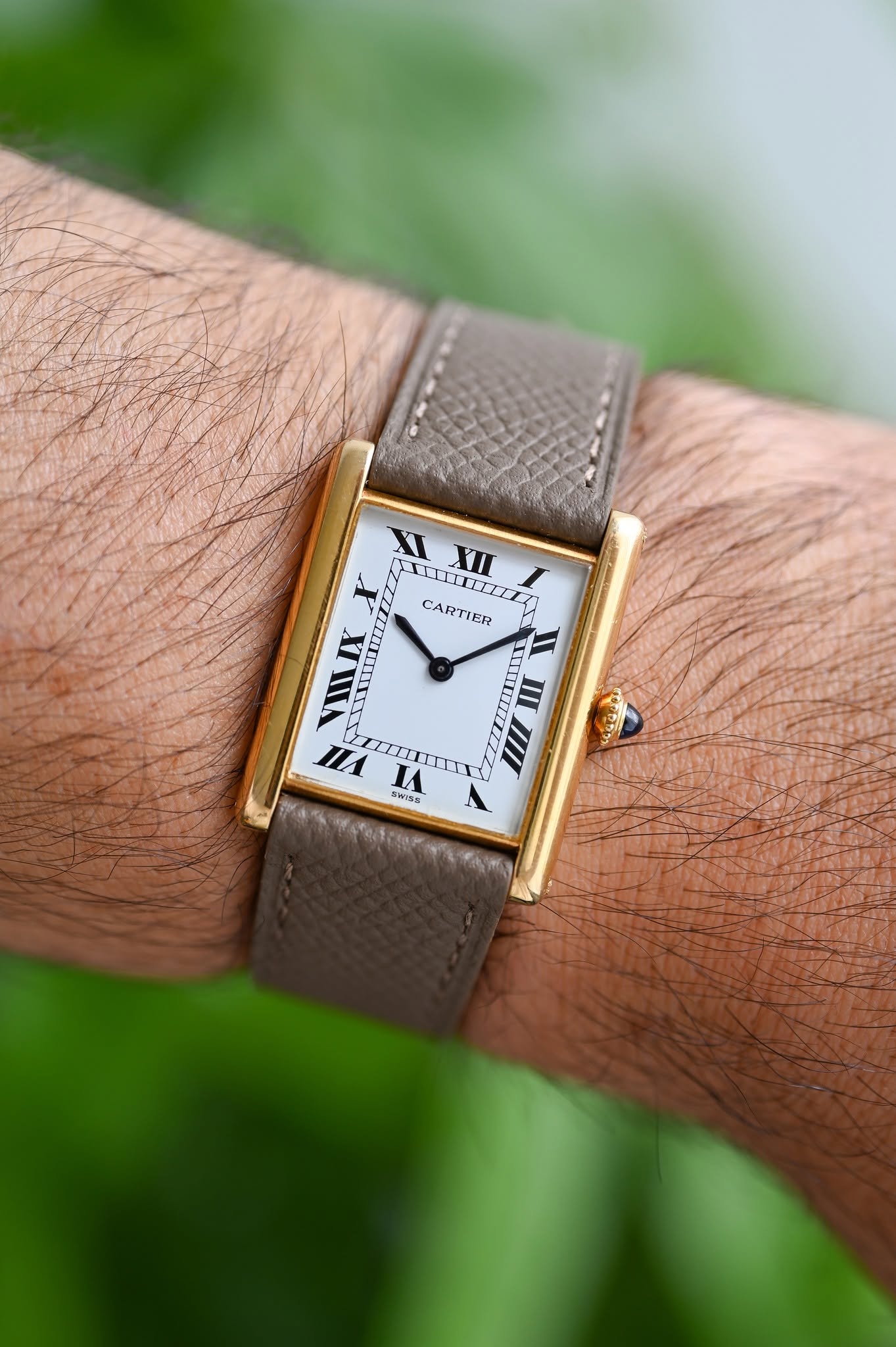 May be an image of digital watch and text