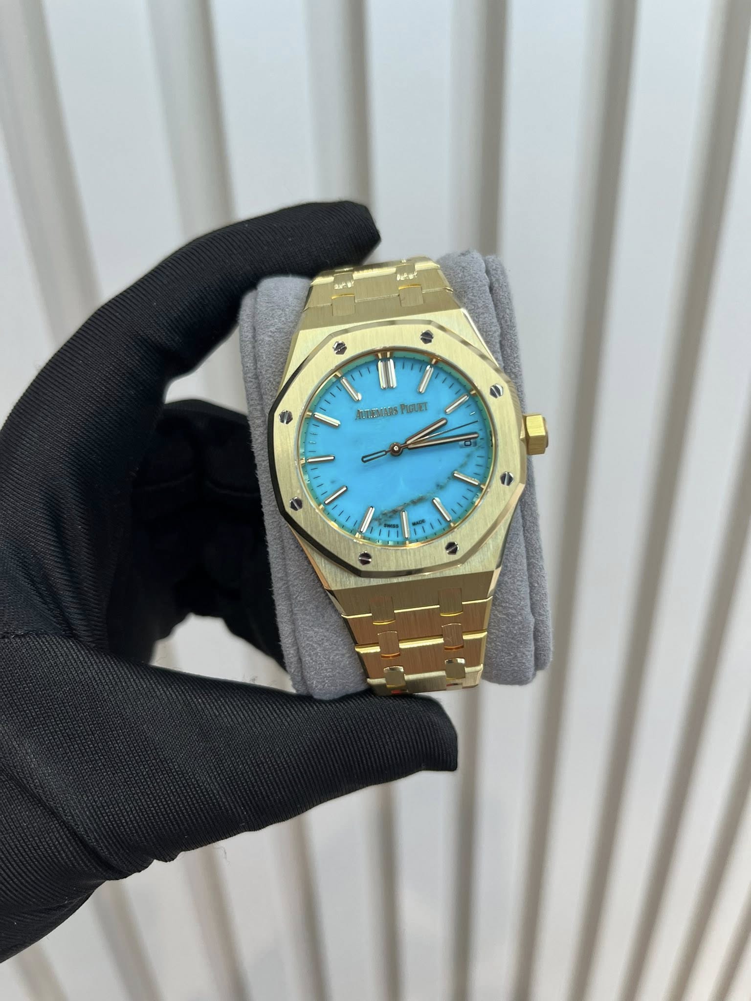 May be an image of wrist watch and text