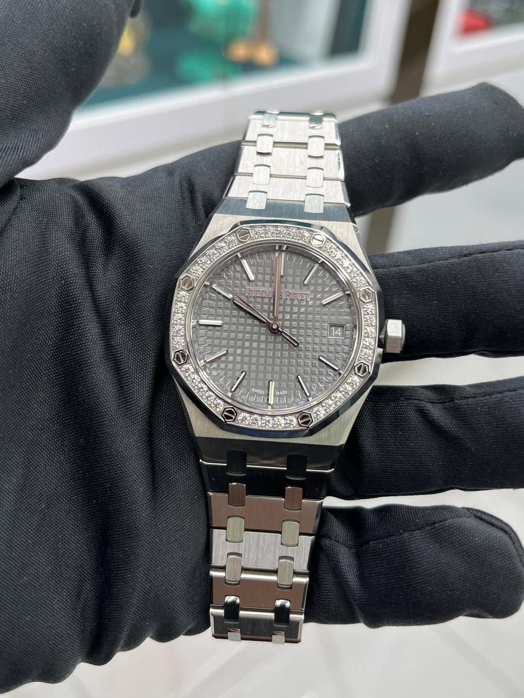 May be an image of wrist watch and text