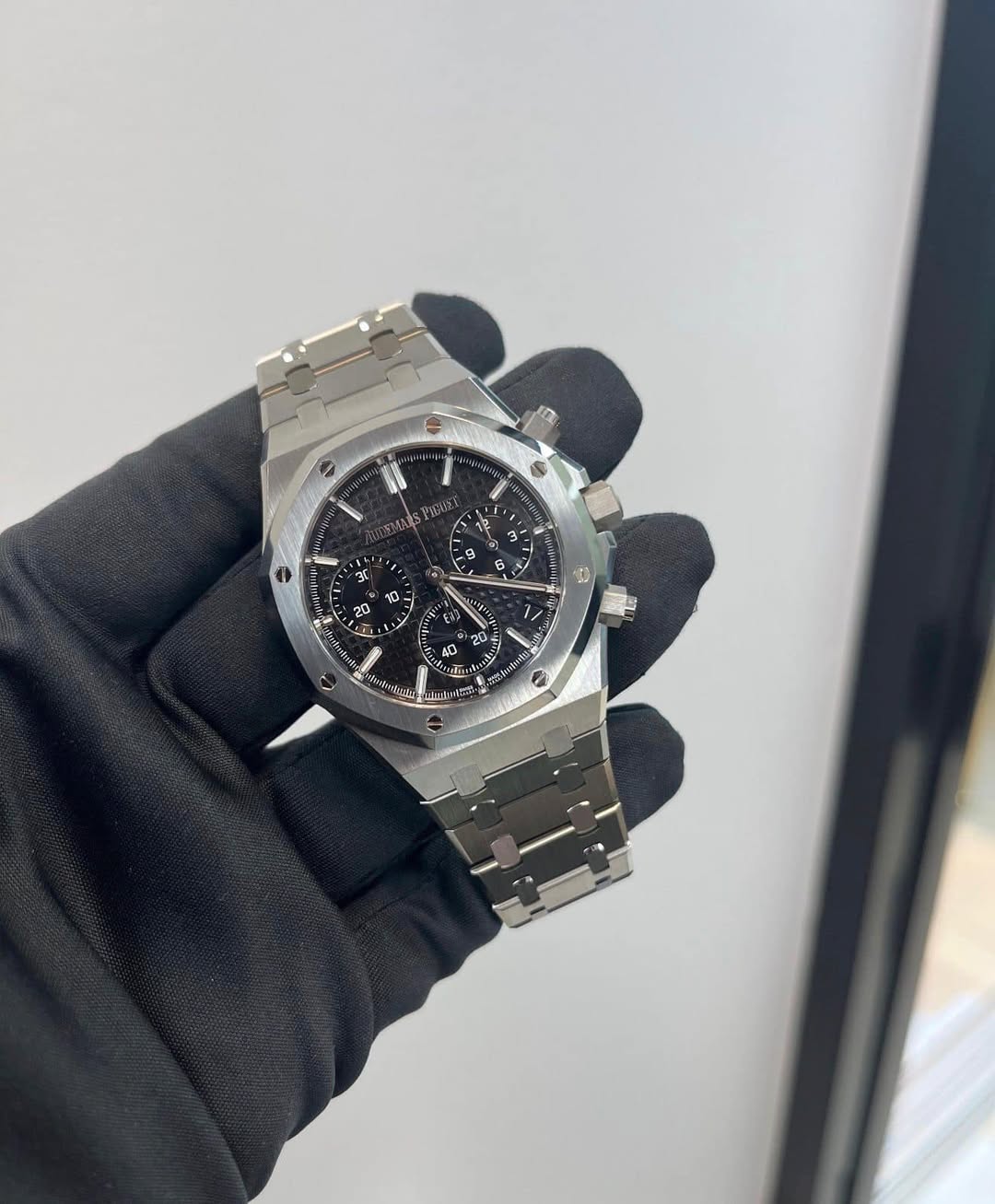 May be an image of wrist watch and text