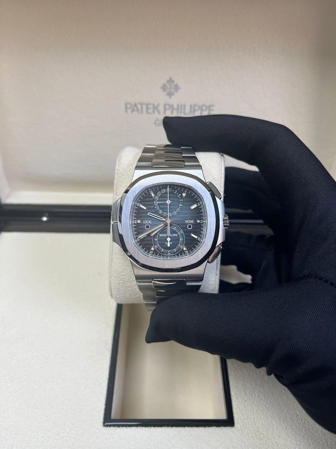 May be an image of wrist watch and text that says 'PATEKPHILIPPE IPPE PATEK PHIL 23- R រូវា E 49-17 好 15 5.13 백비 LOCAL HCME D HaAeK ILP LPF E น'