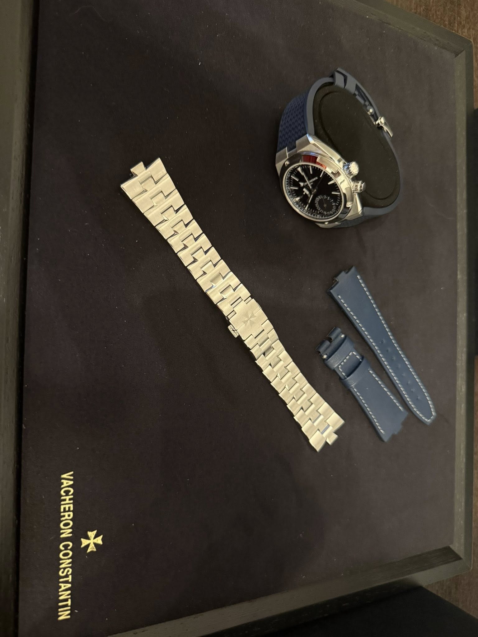 May be an image of wrist watch and text