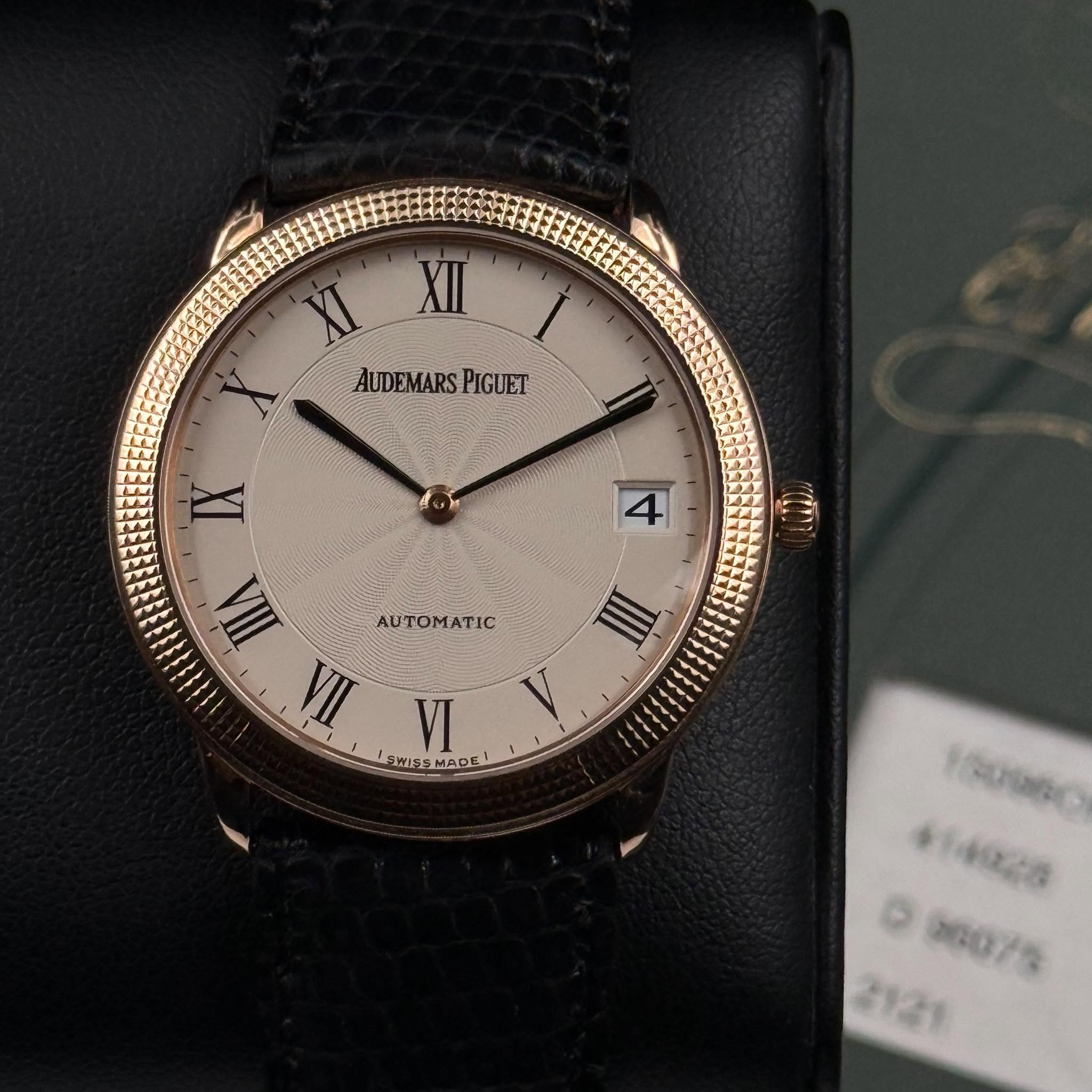 May be an image of wrist watch and text that says 'Ι XII AUDEMARS AUDEMARSPIGUET PIGUET 4 ነ ΑΟΤOMATΙC TIA IIA m VI lSWs AWESMADE C ΜρΕ FAT ၁၀၀ေ # O '