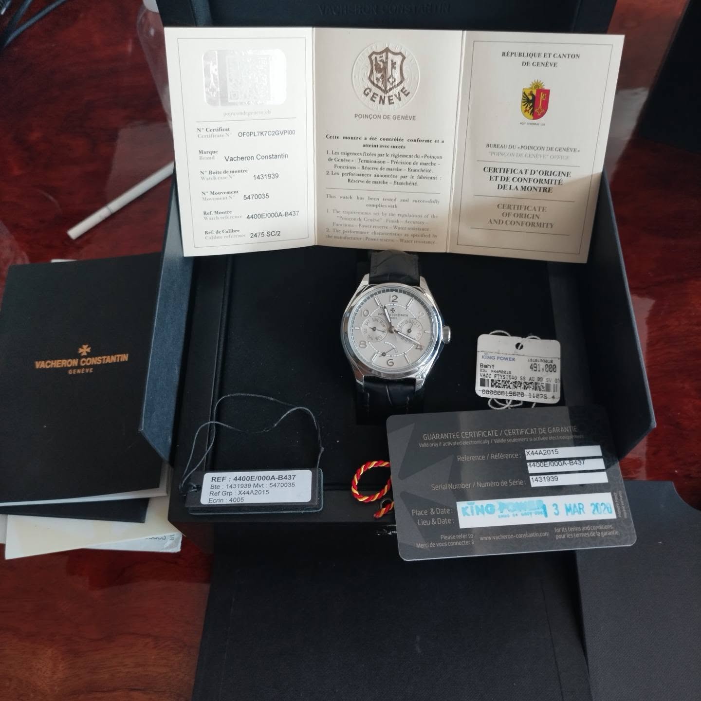 May be an image of wrist watch and text