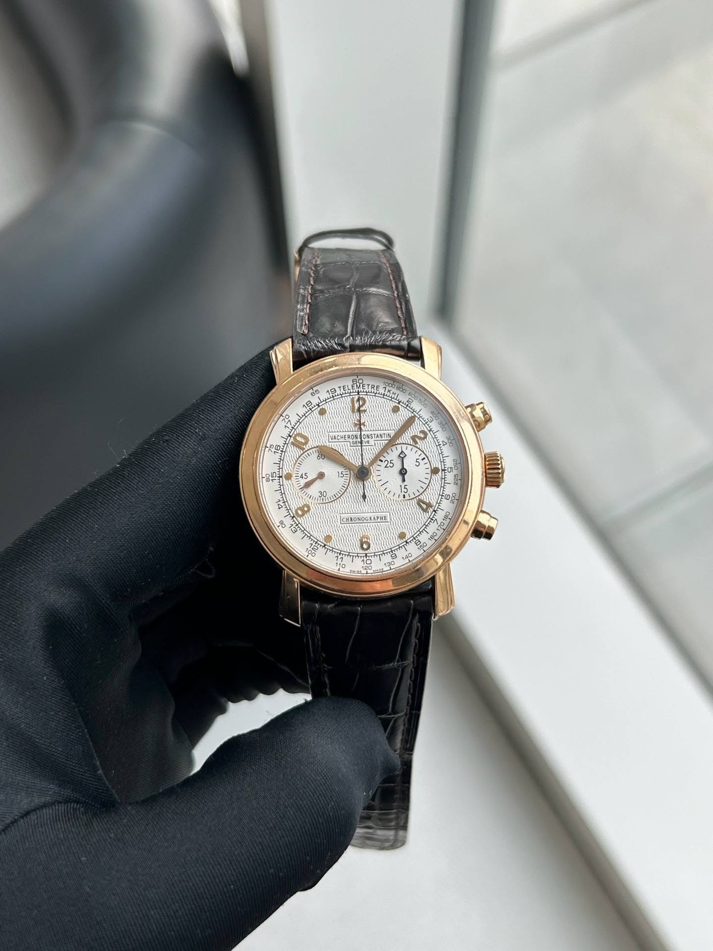 May be an image of wrist watch and text