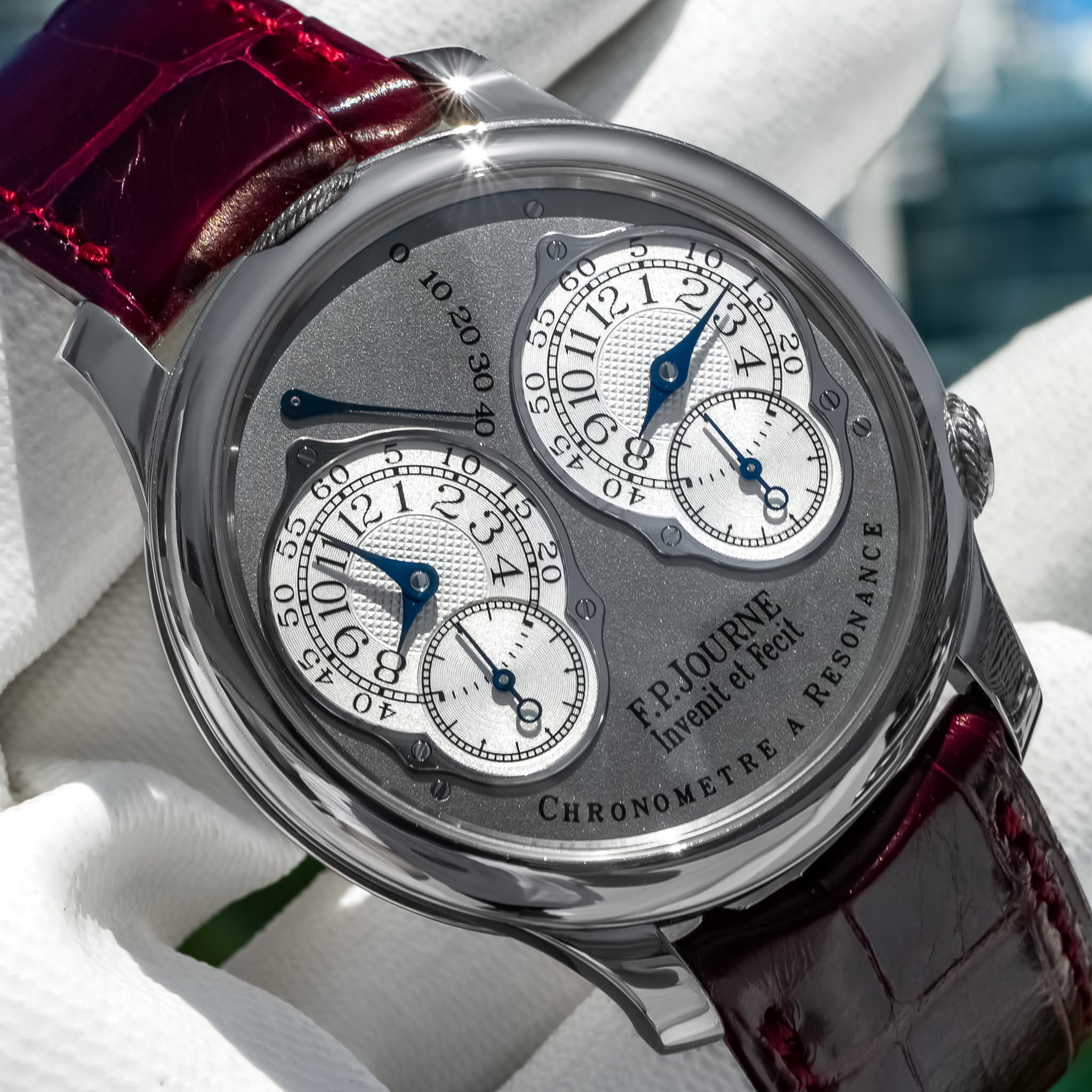 May be an image of wrist watch and text
