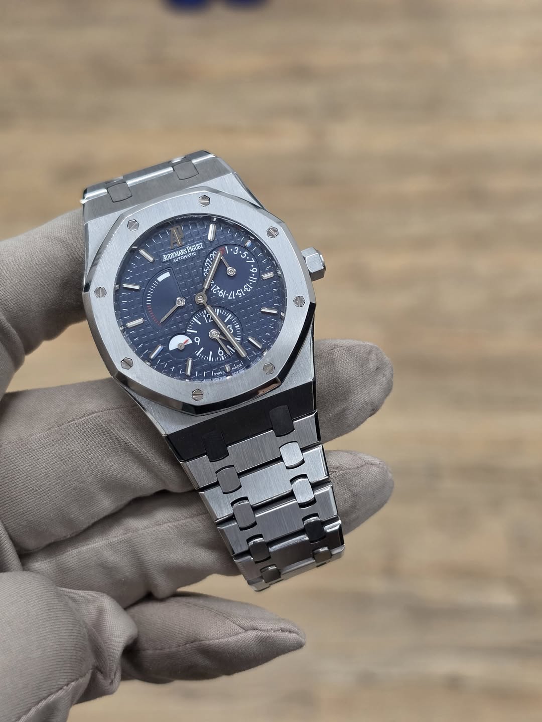 May be an image of wrist watch and text