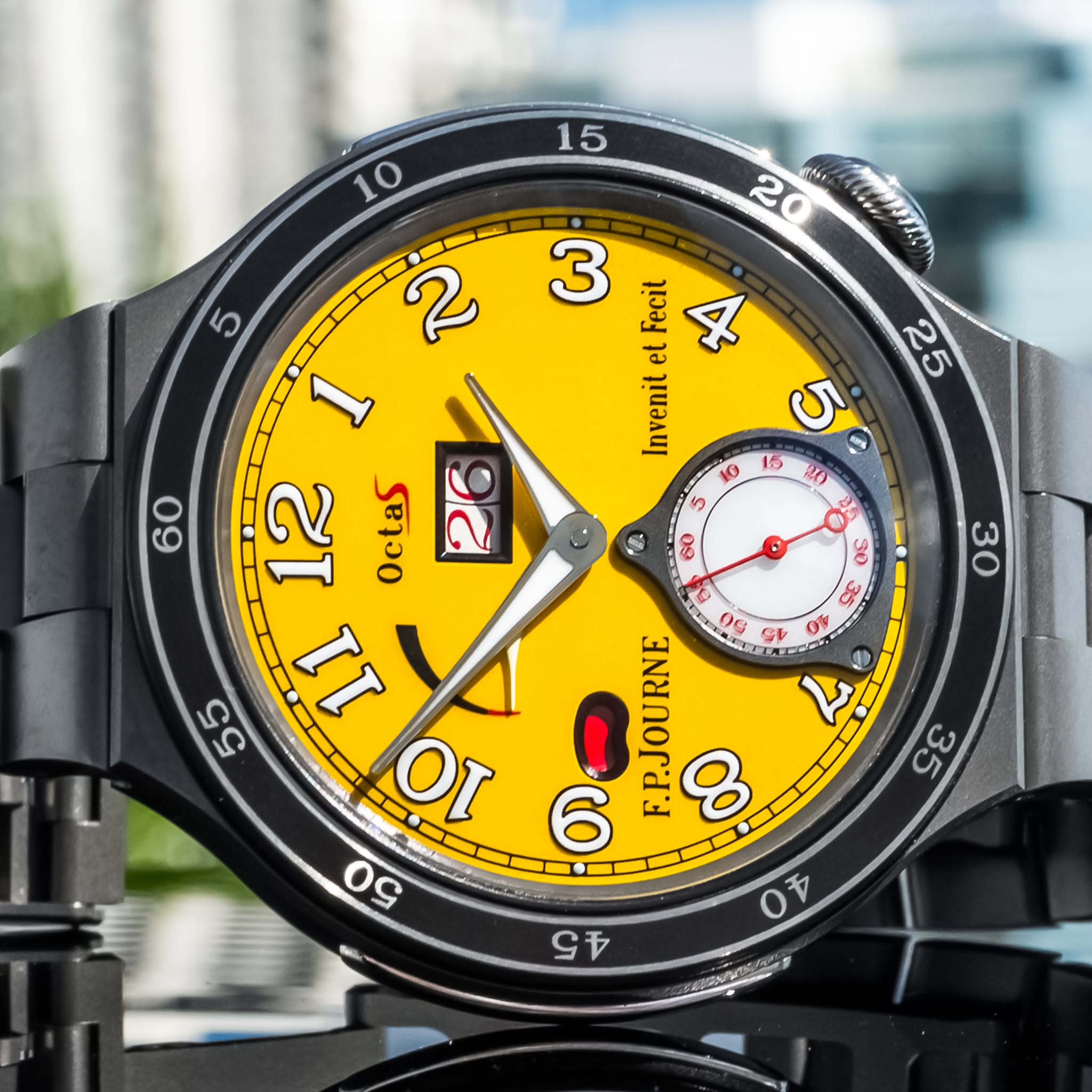 May be an image of wrist watch and text