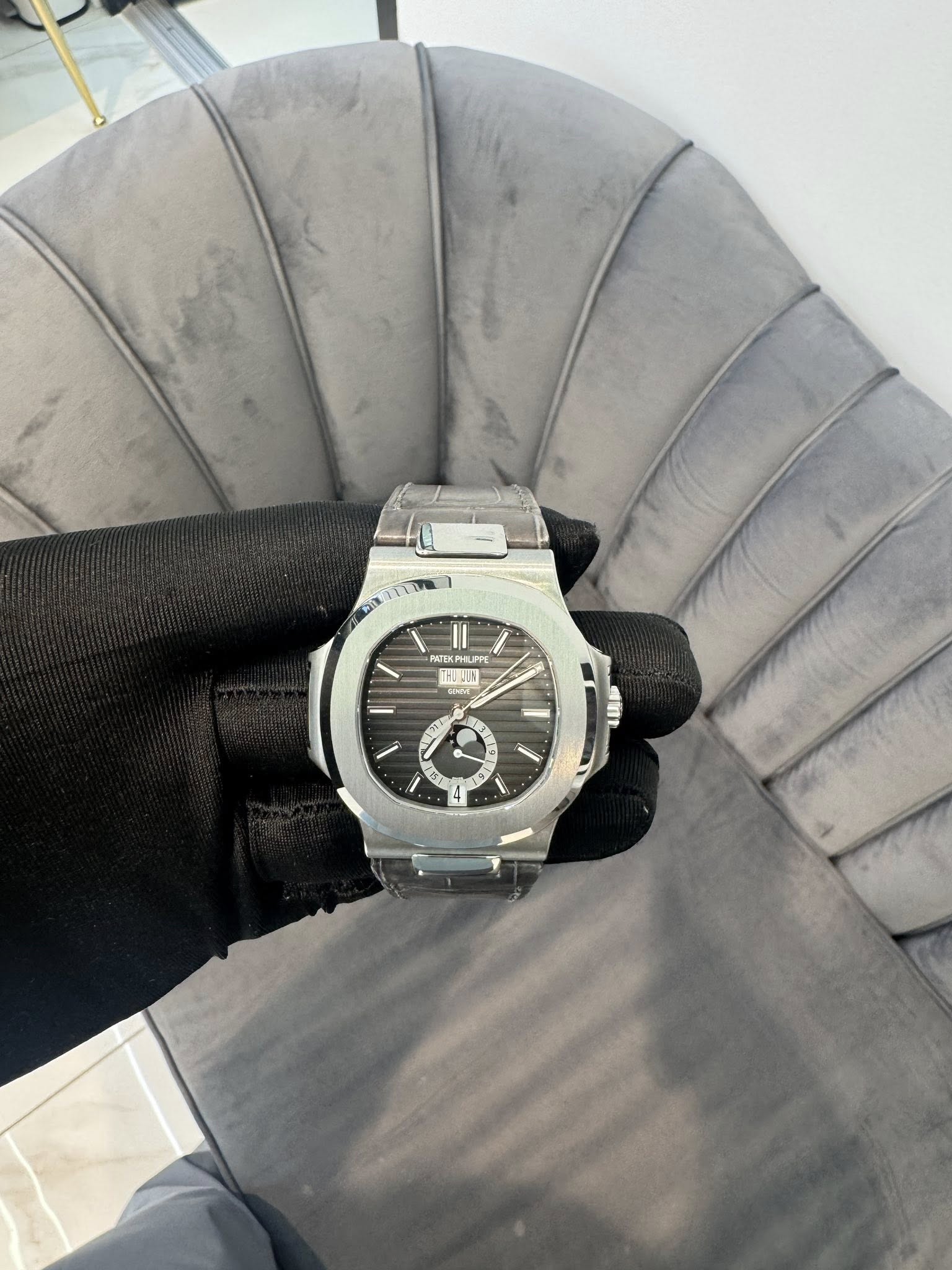 May be an image of wrist watch and text