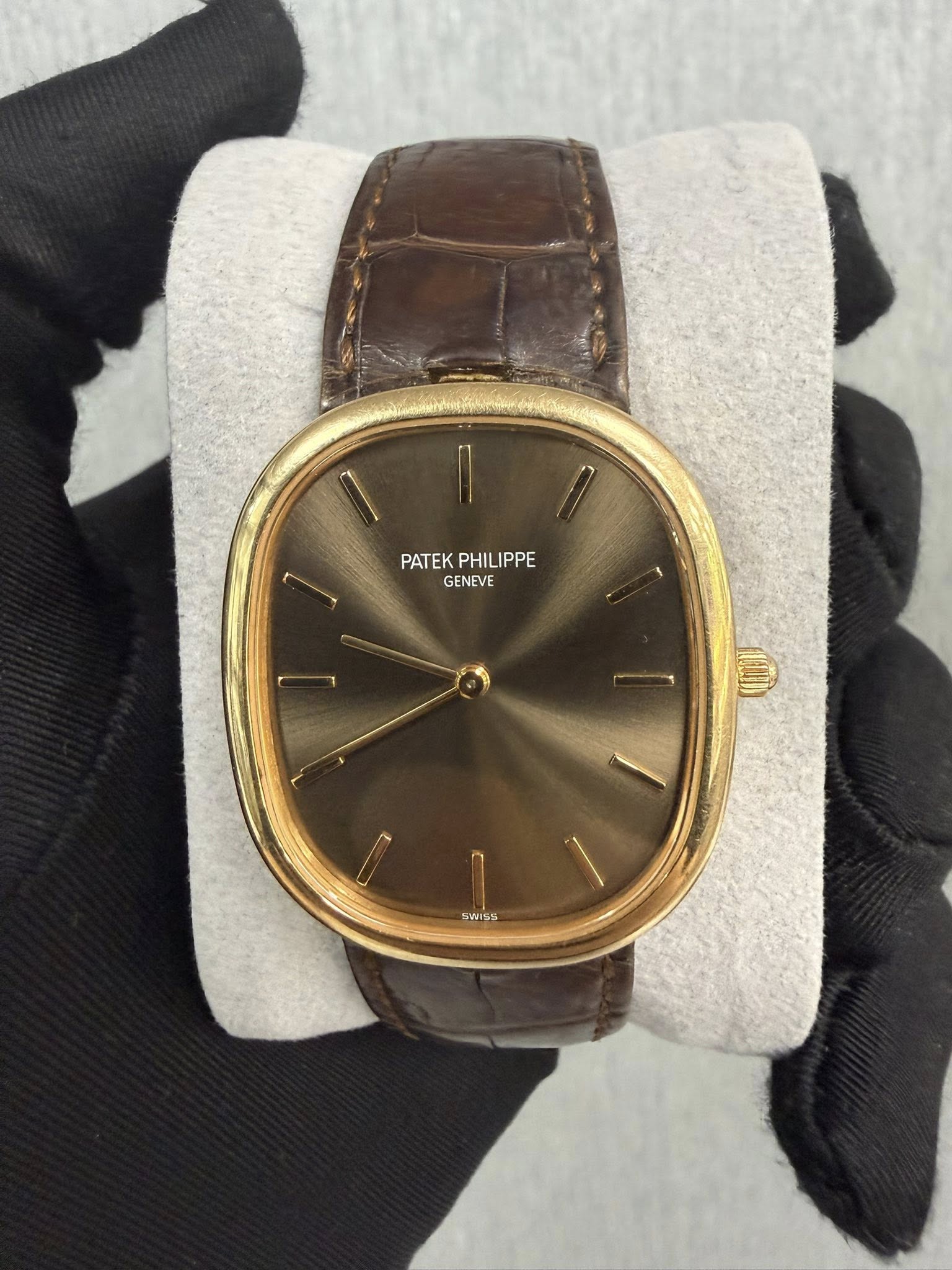 May be an image of wrist watch and text